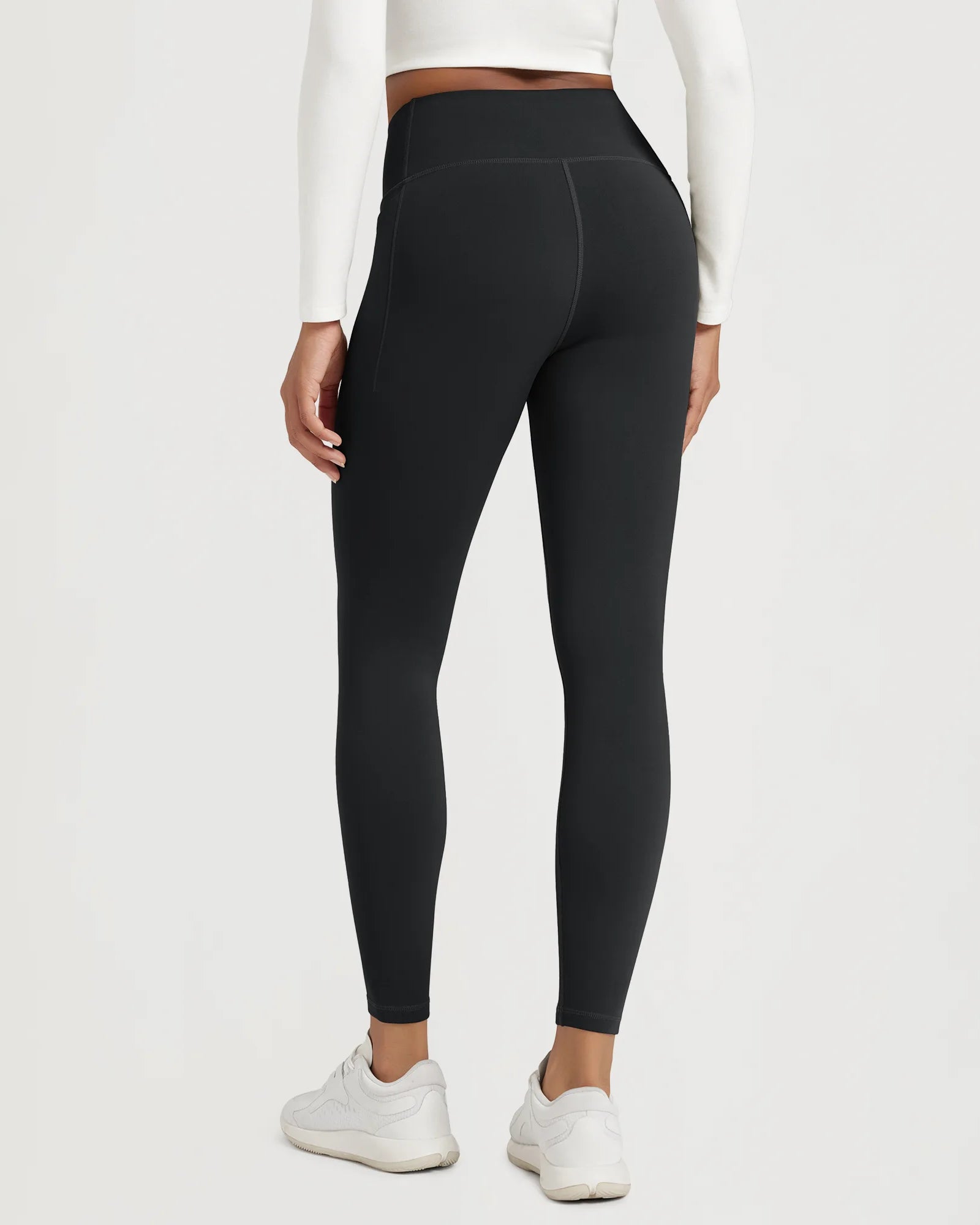 25" Fleece Lined Leggings with Pockets, black leggings shown from the back, featuring a sleek design and functional pockets.