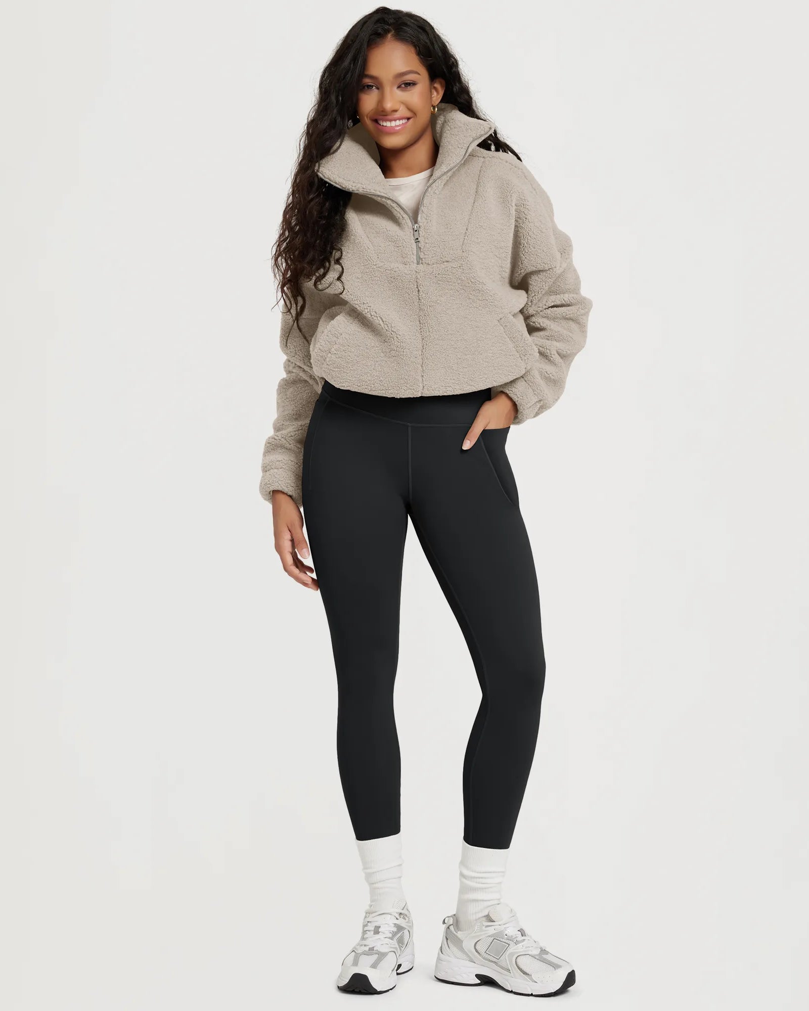 25" Fleece Lined Leggings with Pockets worn by a model with a casual outfit.
