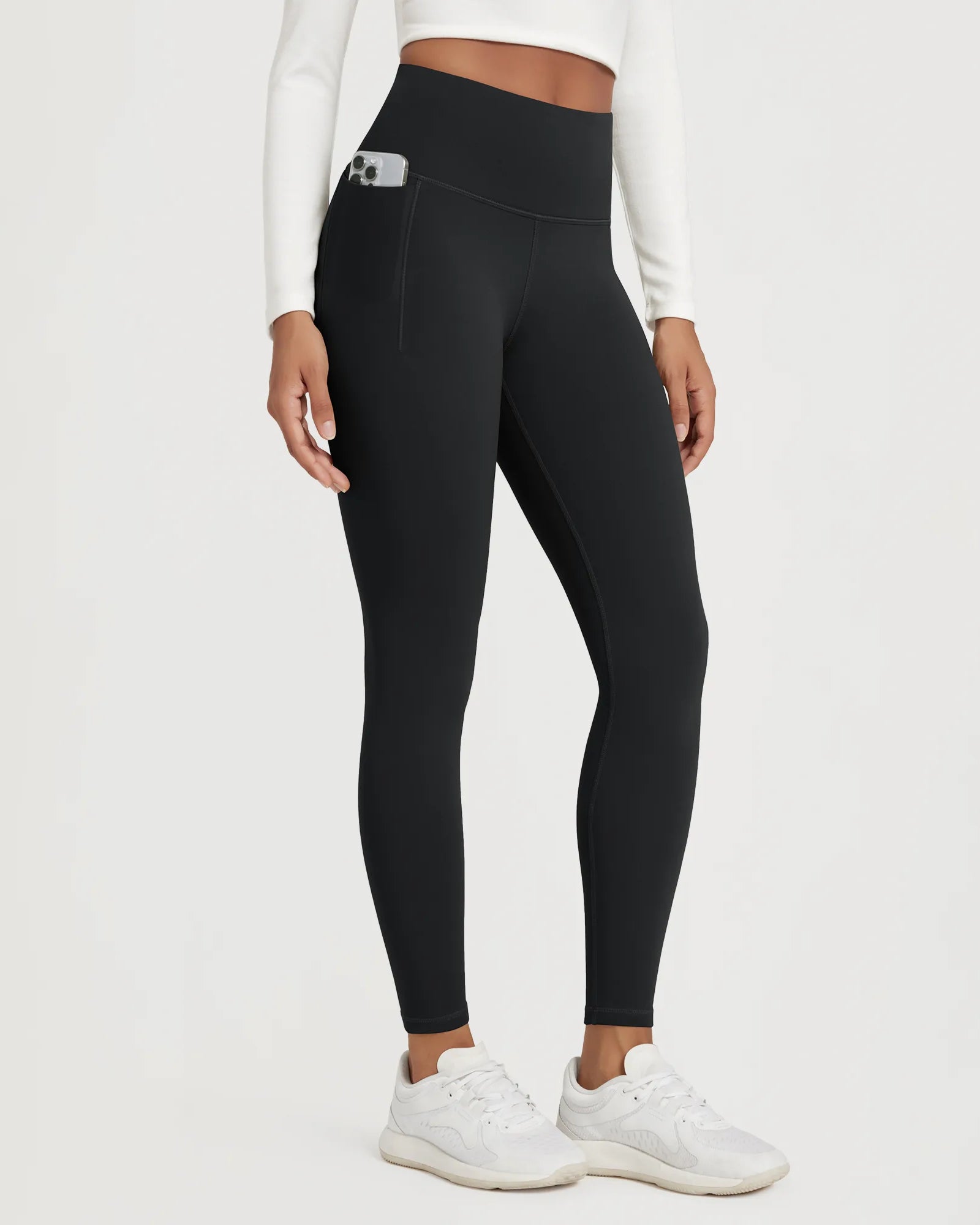 25" Fleece Lined Leggings with Pockets, perfect for comfort and style during workouts or casual wear.