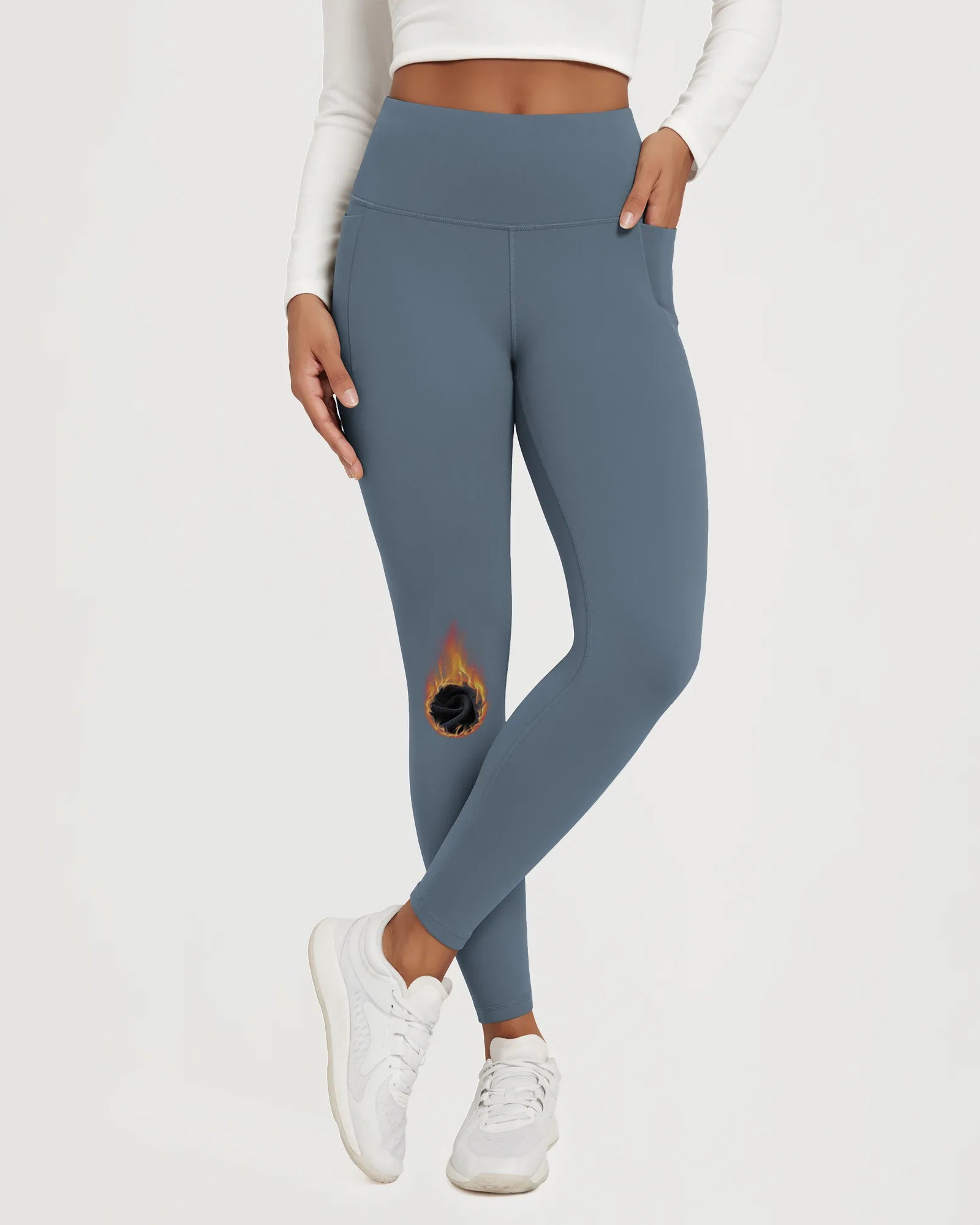 25" Fleece Lined Leggings with Pockets showcased in blue, featuring a unique design and comfortable fit.