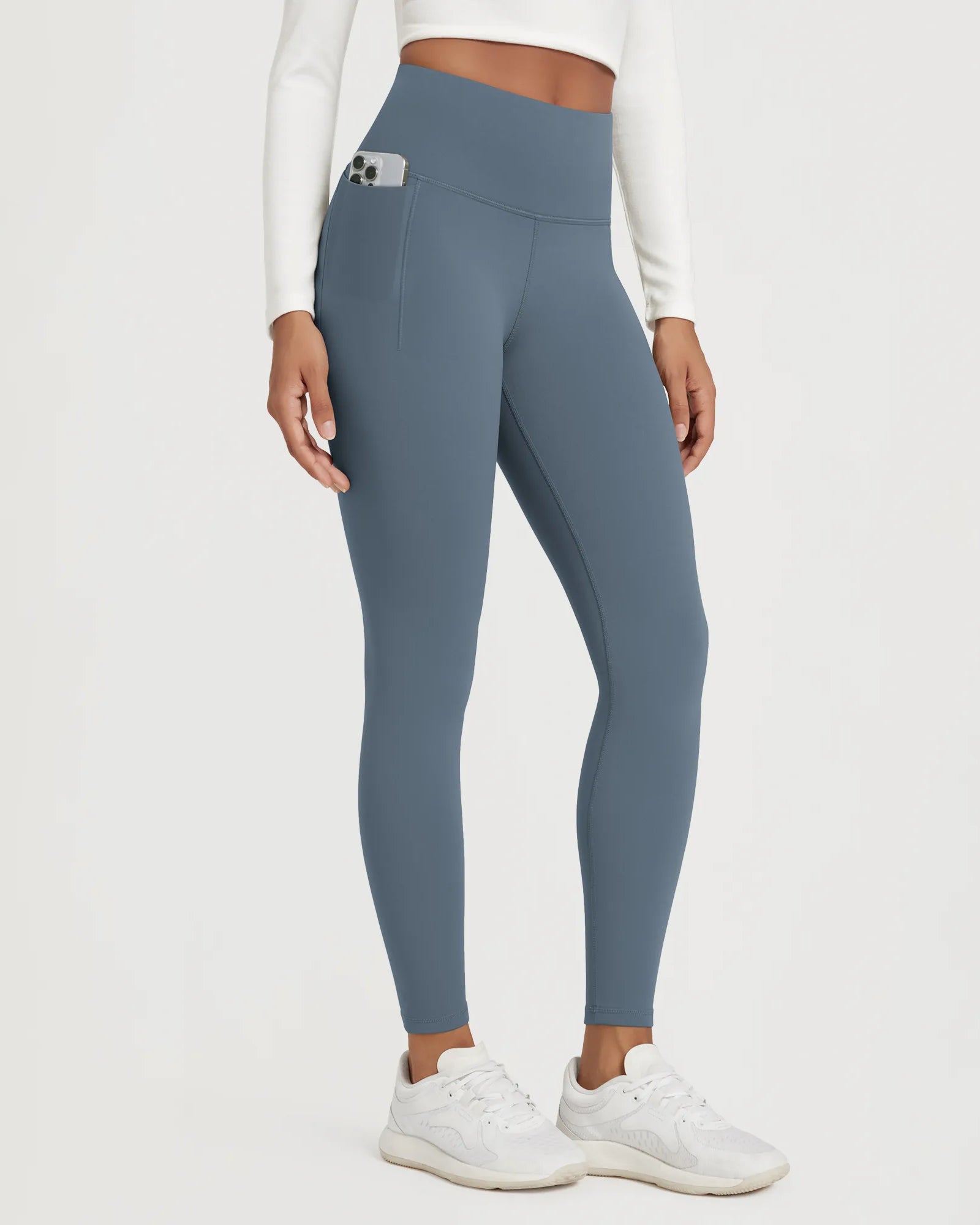 Comfortable 25" Fleece Lined Leggings with Pockets in blue, perfect for workouts and casual wear.