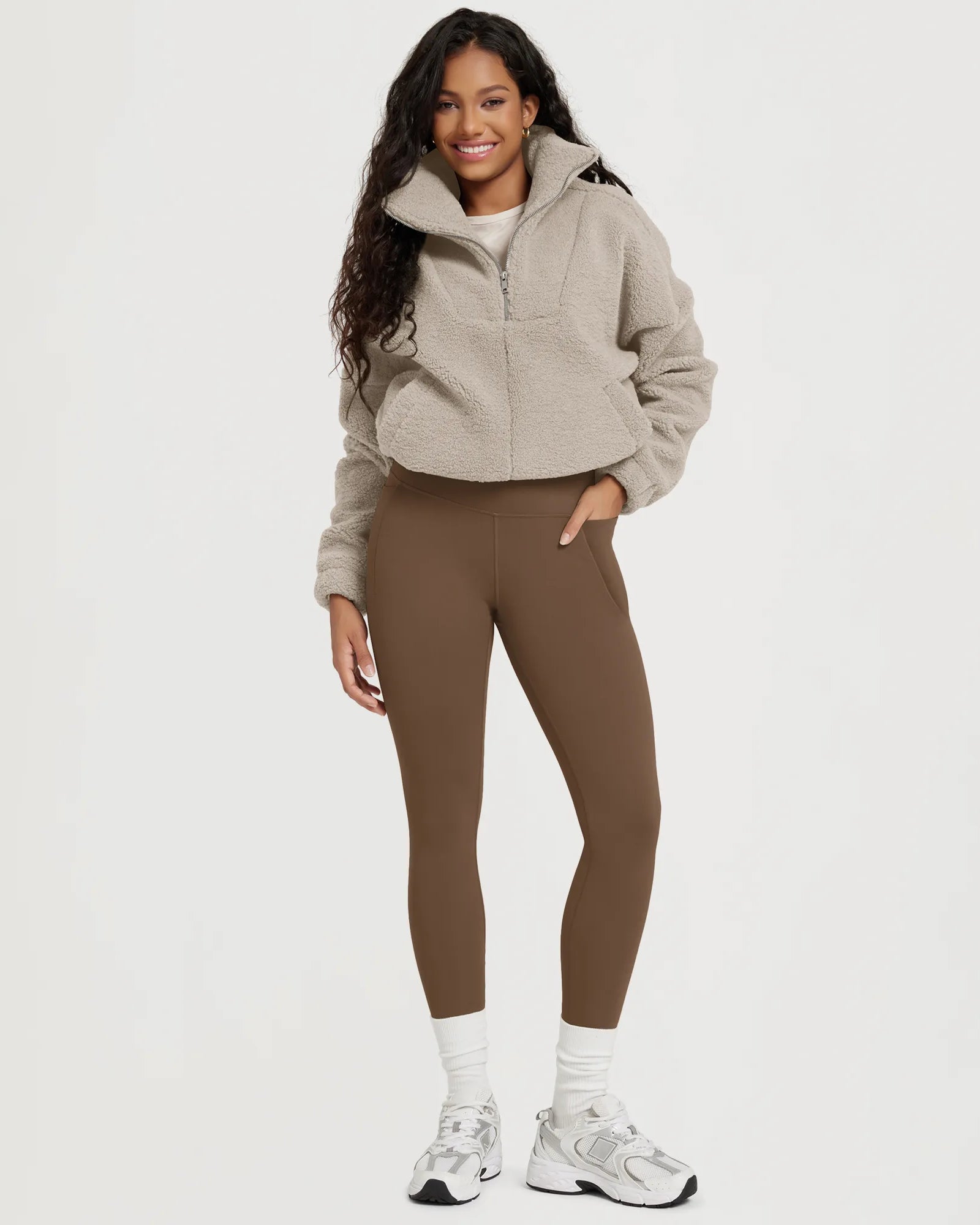 25" Fleece Lined Leggings with Pockets paired with a cozy jacket, perfect for comfort and style.