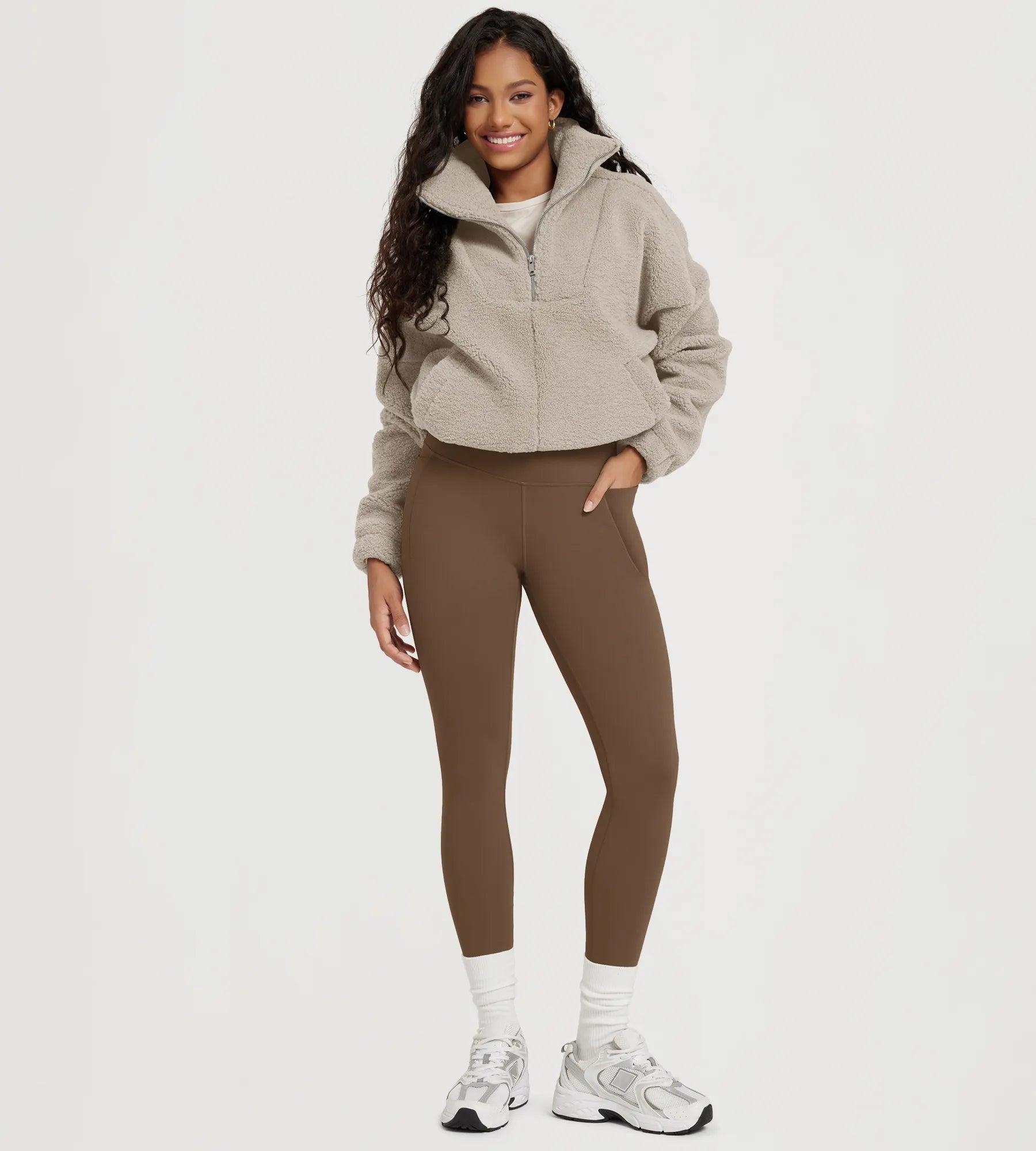 25" Fleece Lined Leggings with Pockets paired with a cozy jacket, perfect for comfort and style.