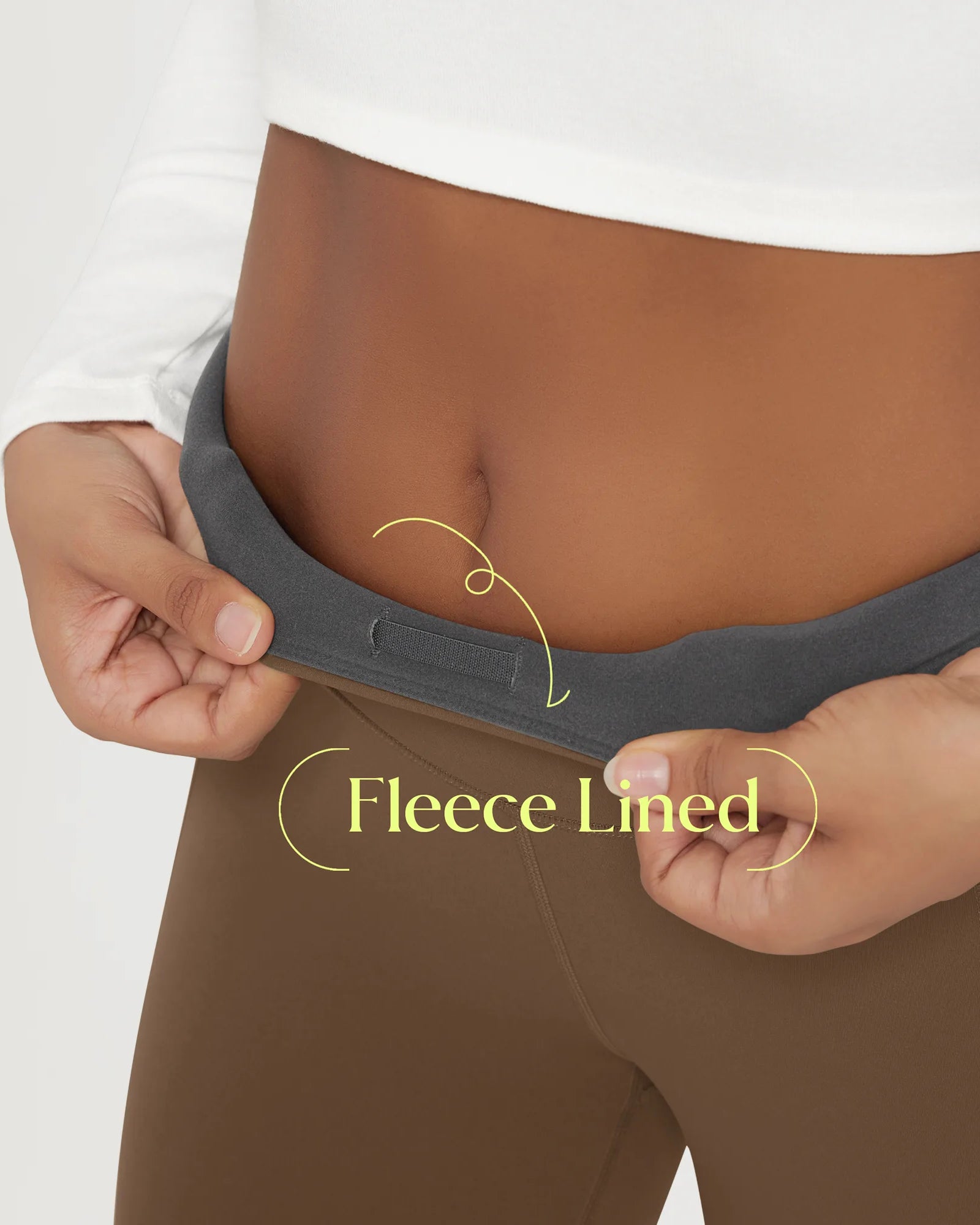 Model demonstrating the comfort and fit of 25" Fleece Lined Leggings with Pockets, highlighting the fleece lining.