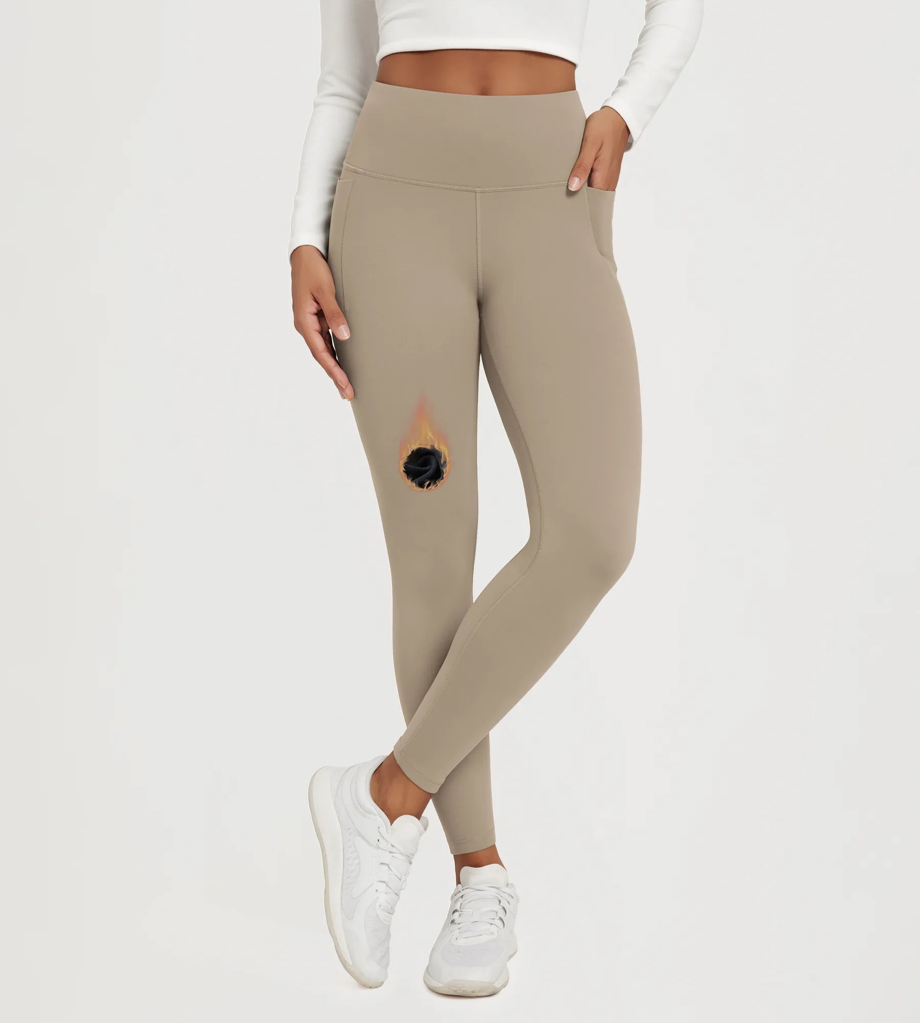 25" Fleece Lined Leggings with Pockets in beige color, featuring a burn mark detail and a sleek fit.