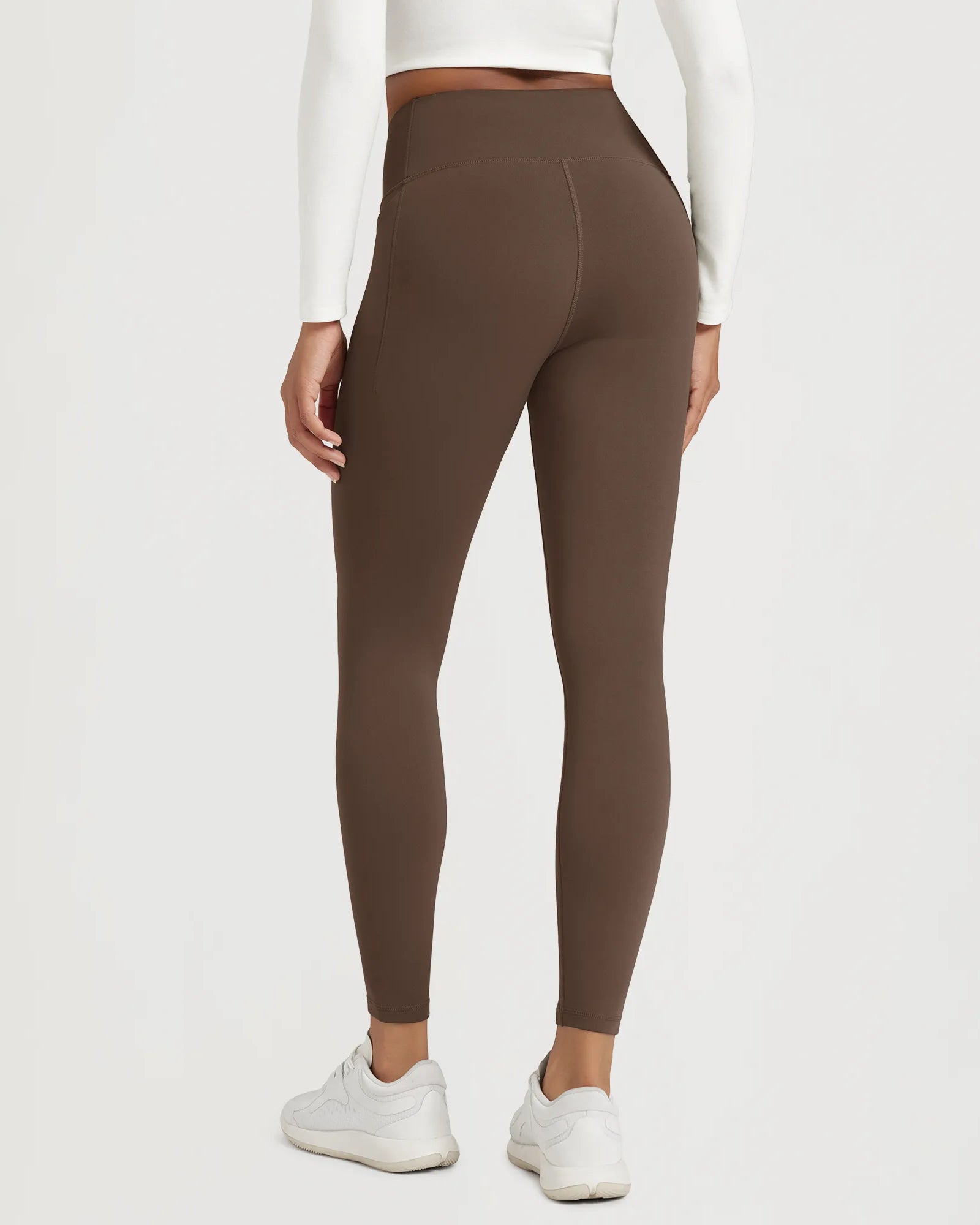 25" Fleece Lined Leggings with Pockets shown from the back, featuring a sleek brown design and comfortable fit.