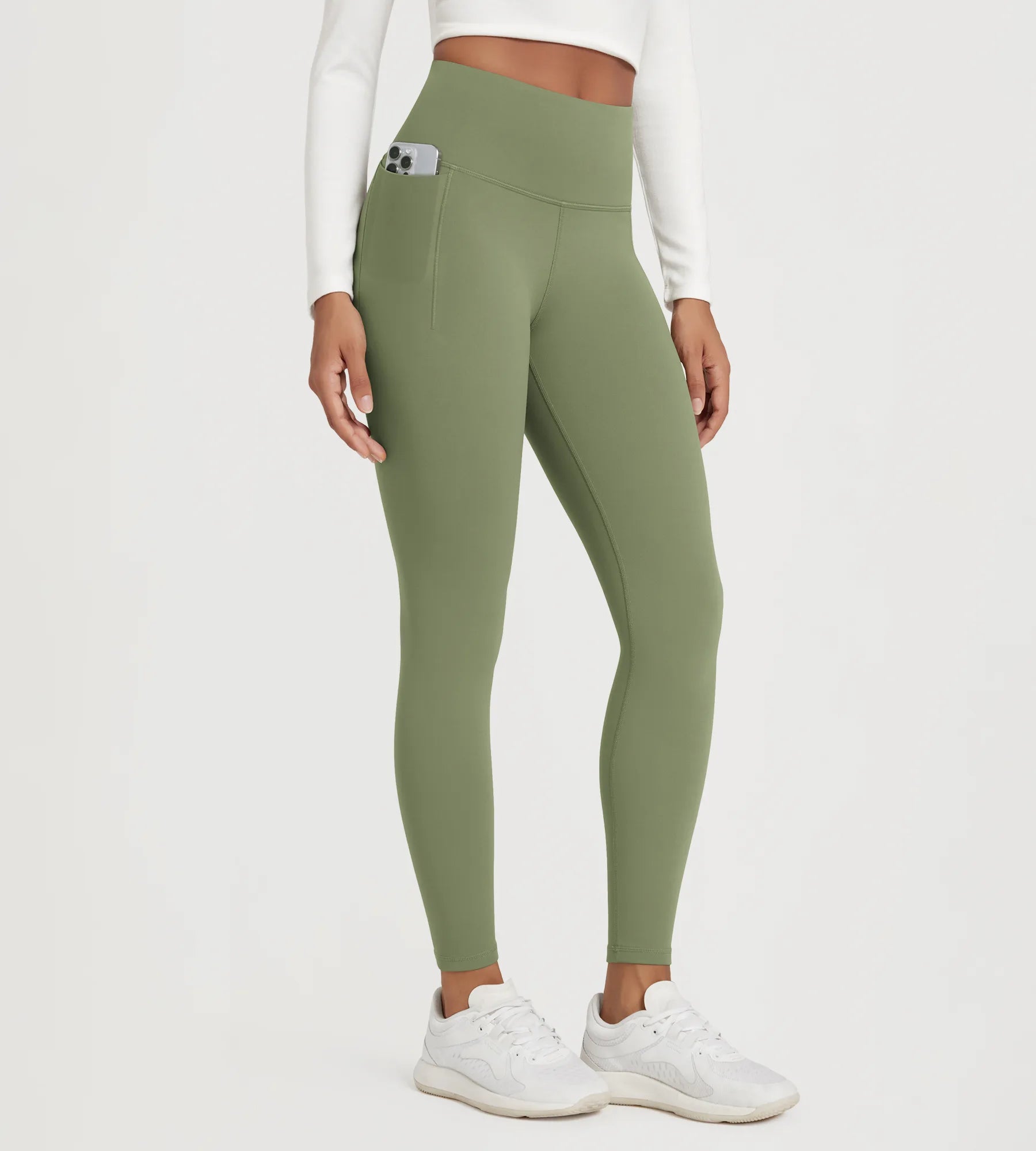 25" Fleece Lined Leggings with Pockets in olive green, stylish and functional for everyday wear.