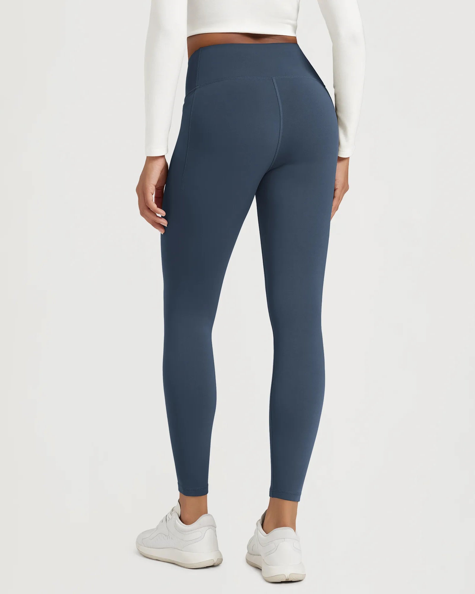 25" Fleece Lined Leggings with Pockets showcased in a stylish design, perfect for comfort and functionality.