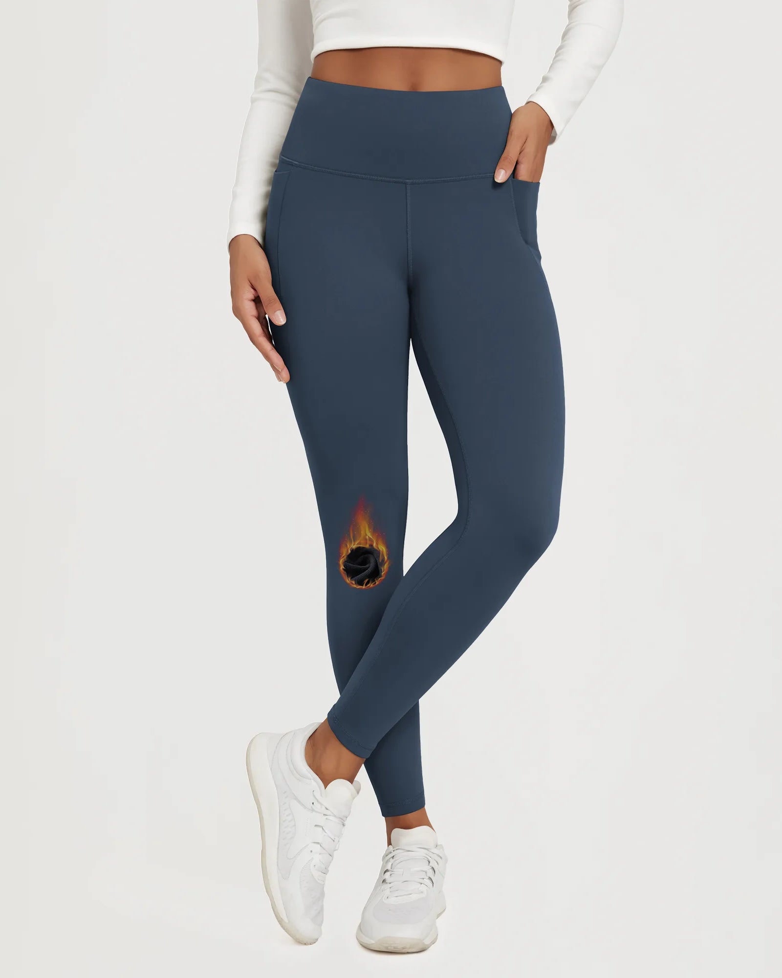 25" Fleece Lined Leggings with Pockets in navy blue, featuring a unique design and comfortable fit.