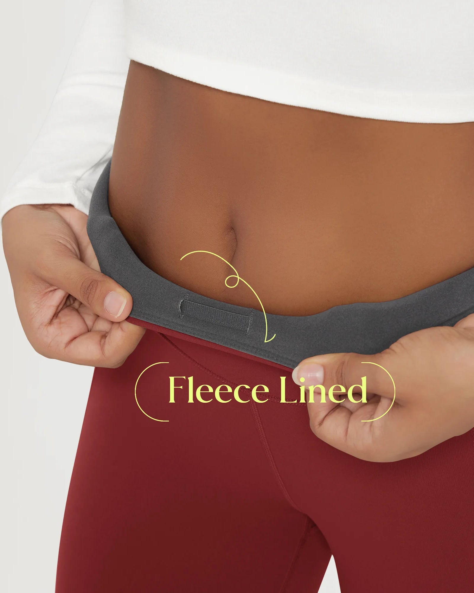 Model showcasing the waistband of 25" Fleece Lined Leggings with Pockets, emphasizing fleece lining comfort.