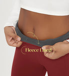 Model showcasing the waistband of 25" Fleece Lined Leggings with Pockets, emphasizing fleece lining comfort.