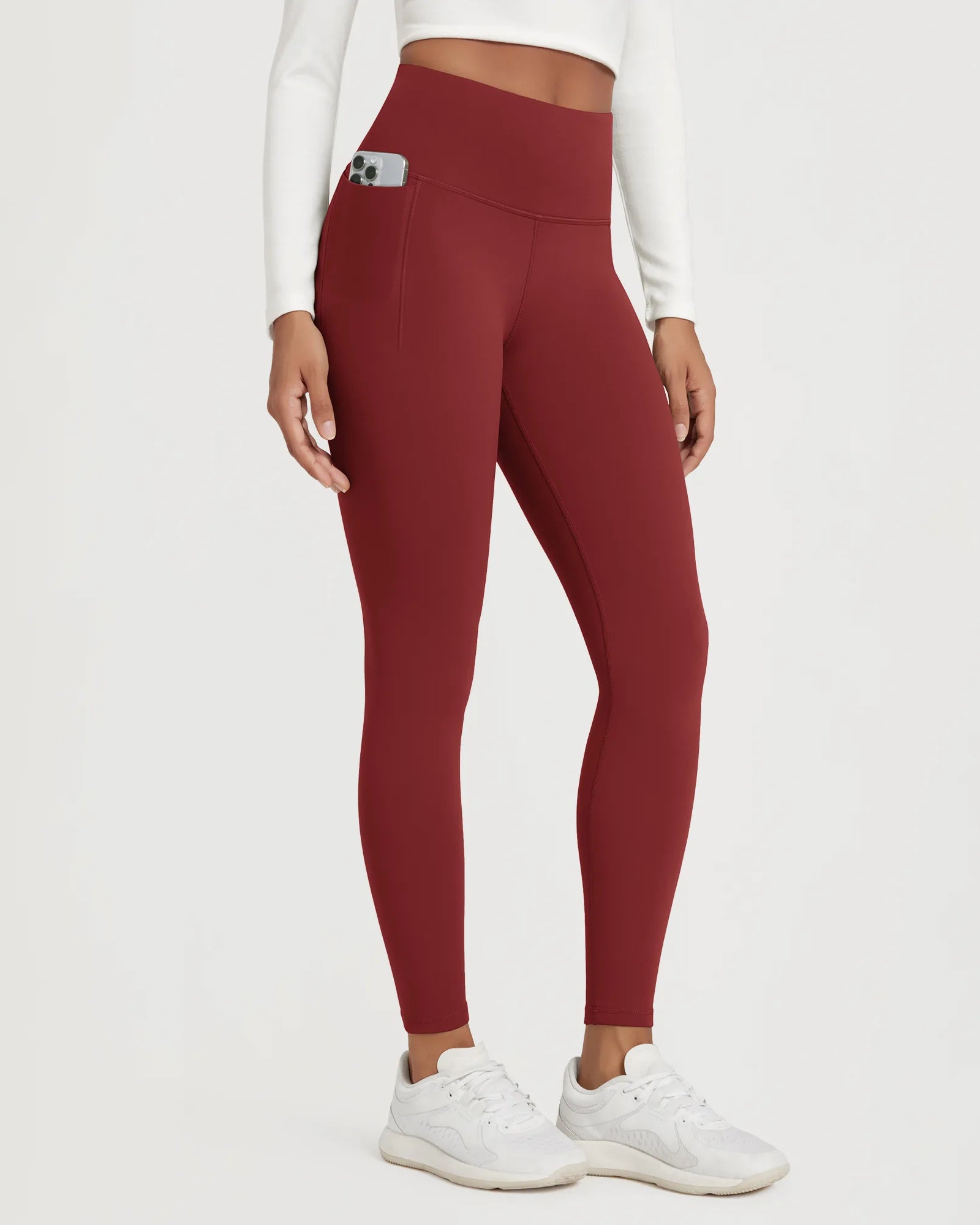 25" Fleece Lined Leggings with Pockets in burgundy color, designed for comfort and style.