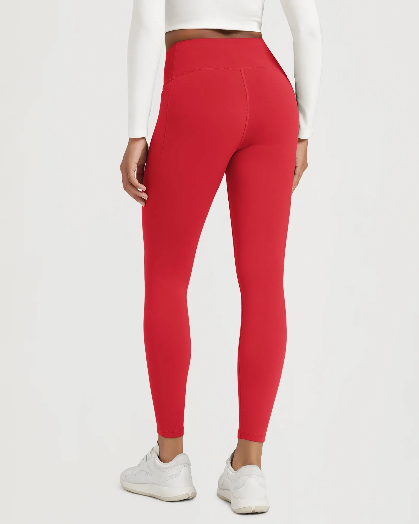25" Fleece Lined Leggings with Pockets in vibrant red, designed for comfort and style.