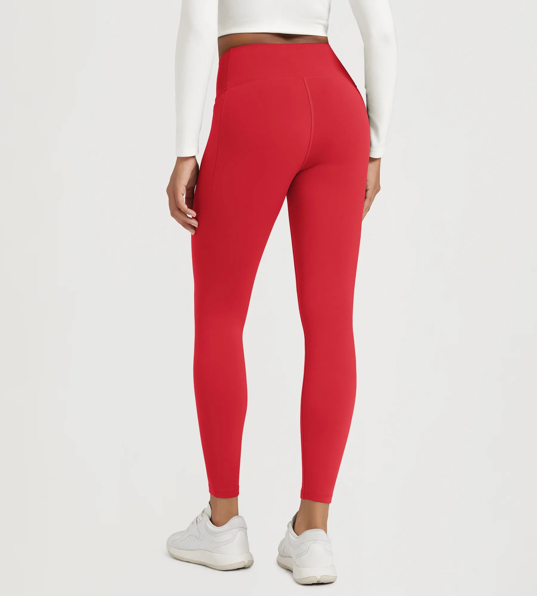 25" Fleece Lined Leggings with Pockets in vibrant red, designed for comfort and style.