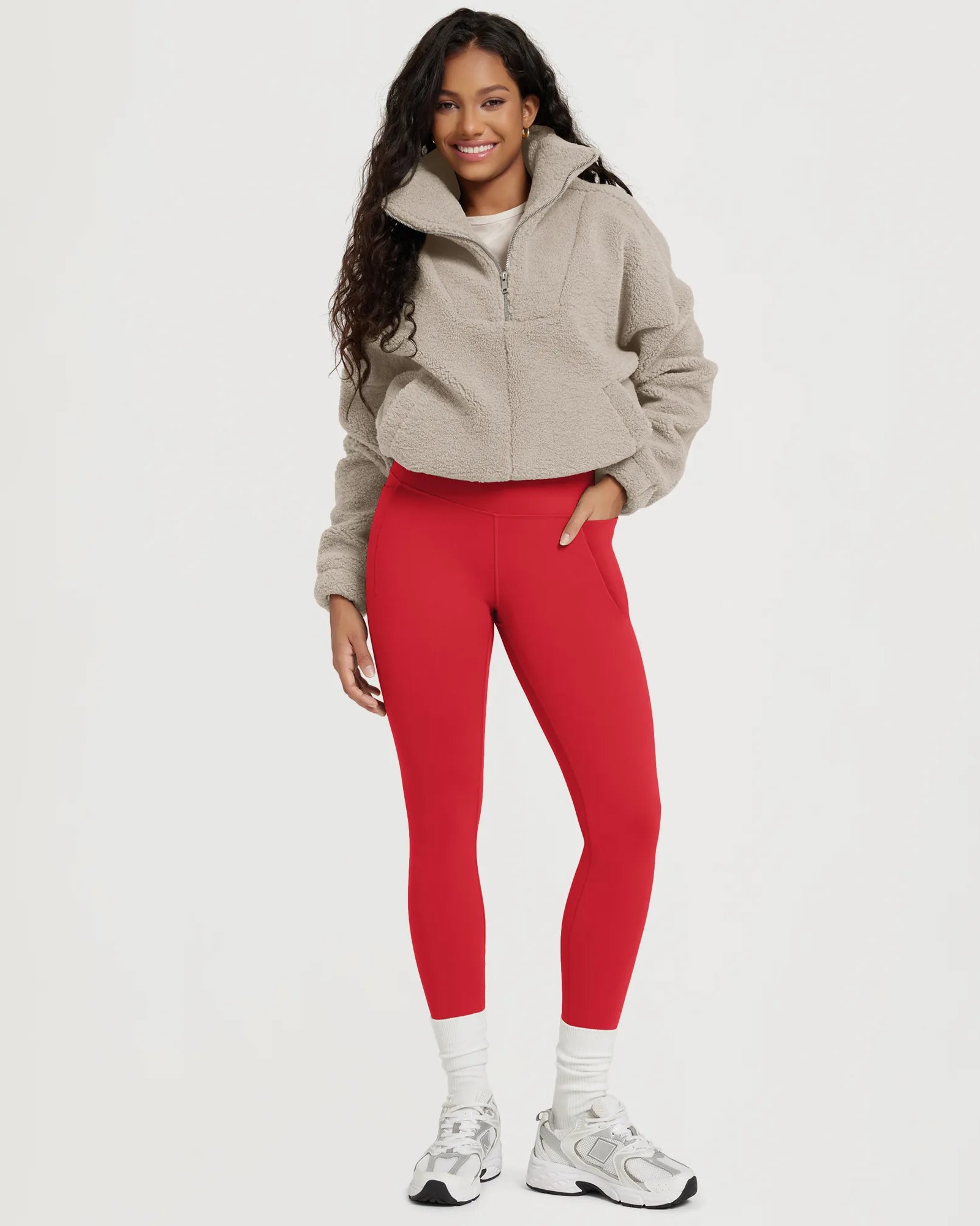 25" Fleece Lined Leggings with Pockets in red, paired with a cozy beige fleece jacket.