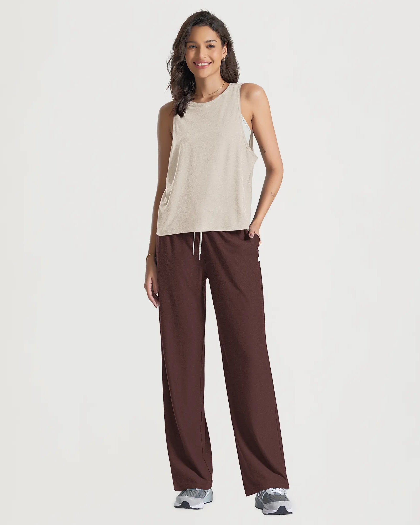 ODODOS Stratum Loose Tank Top paired with comfortable athletic pants for summer wear.