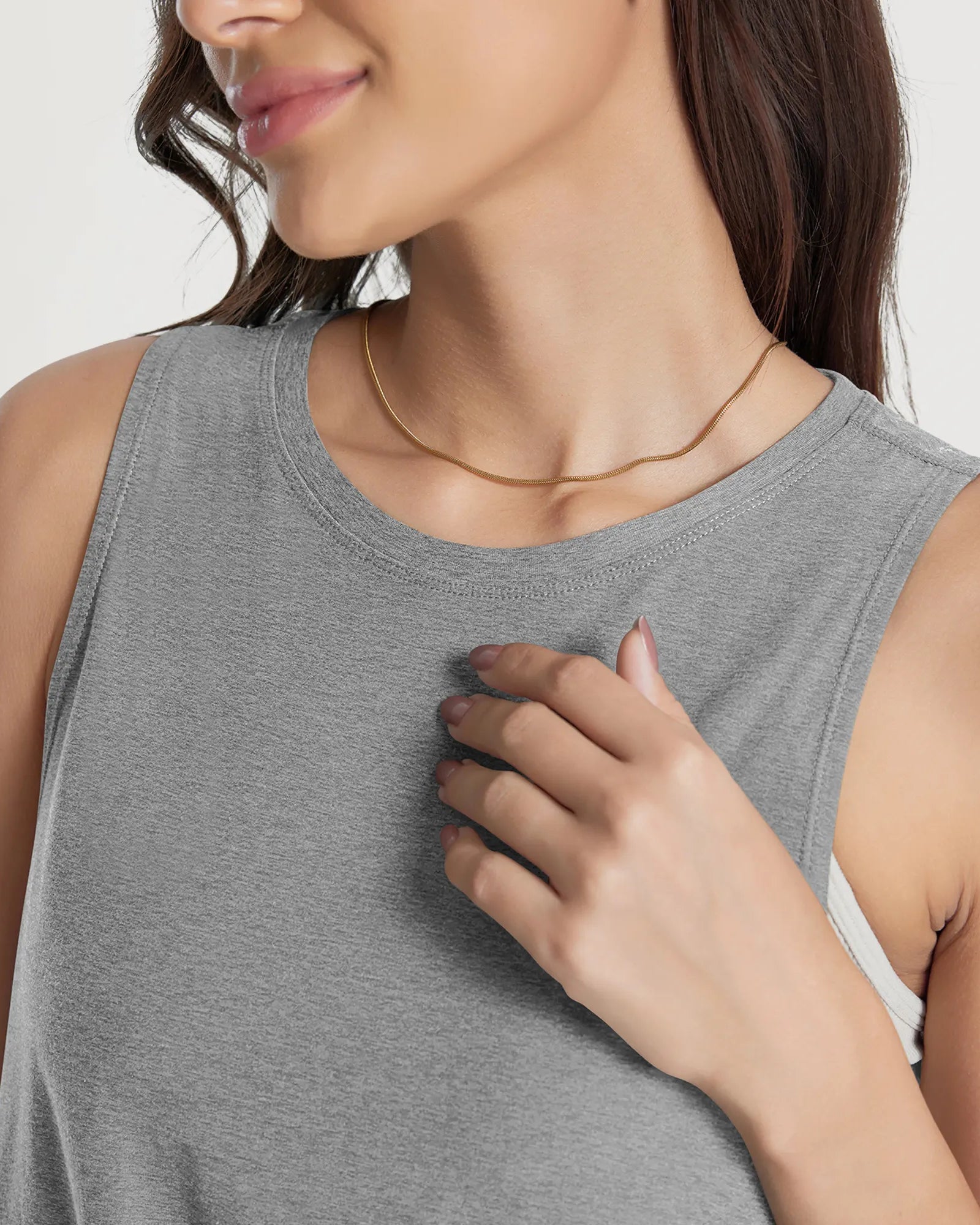 ODODOS Stratum loose tank top, featuring breathable soft fabric and athletic fit.