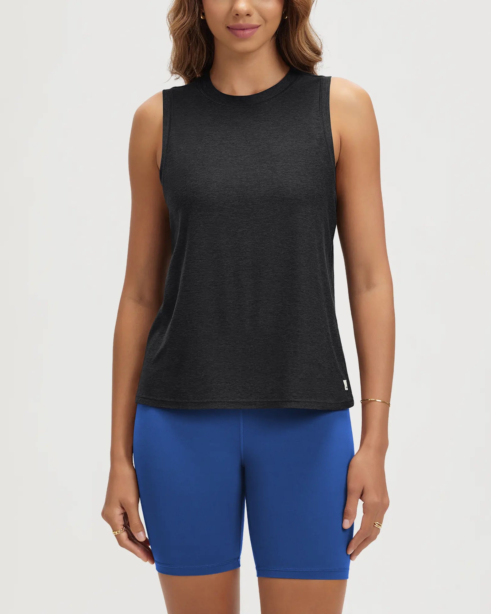 ODODOS Stratum Women's Performance Tank in black, ideal for workout wear and summer essentials.