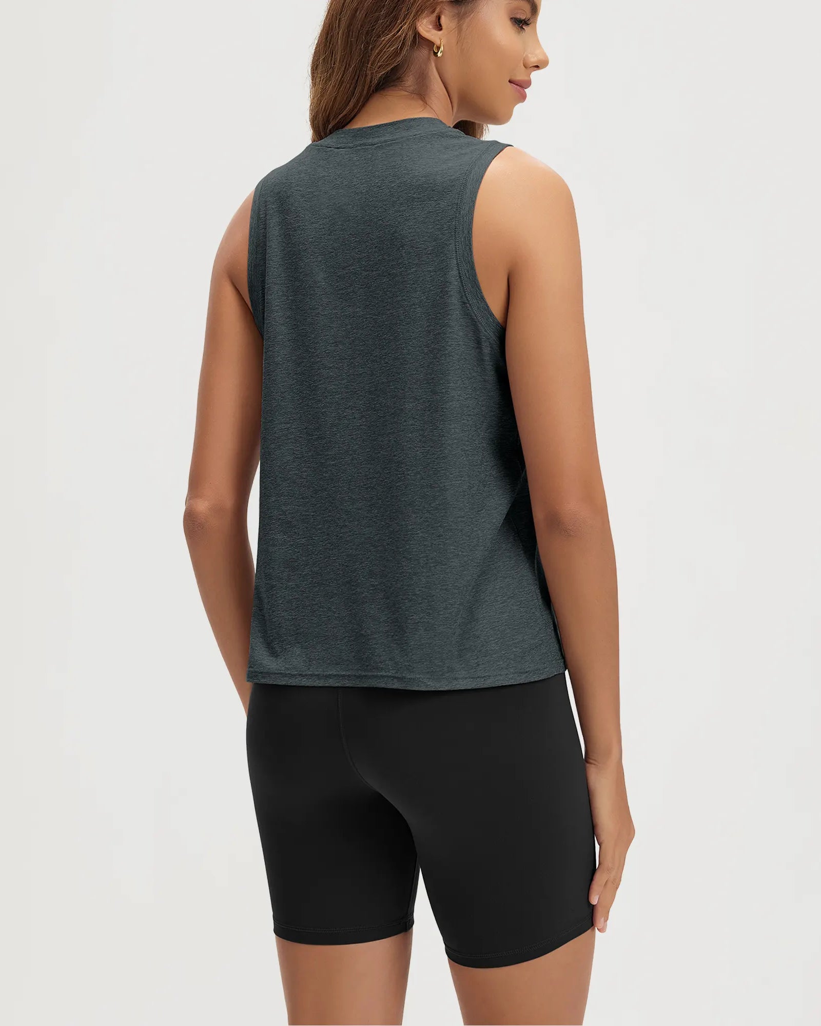 ODODOS Stratum Women's Performance Tank in breathable fabric with loose fit.