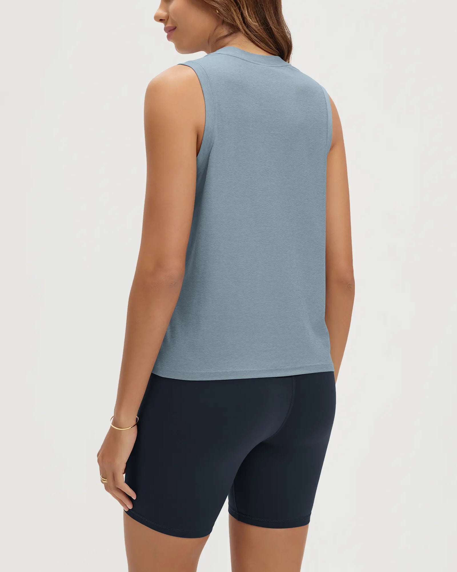 ODODOS Stratum Women's Performance Tank in soft fabric, paired with modal shorts.