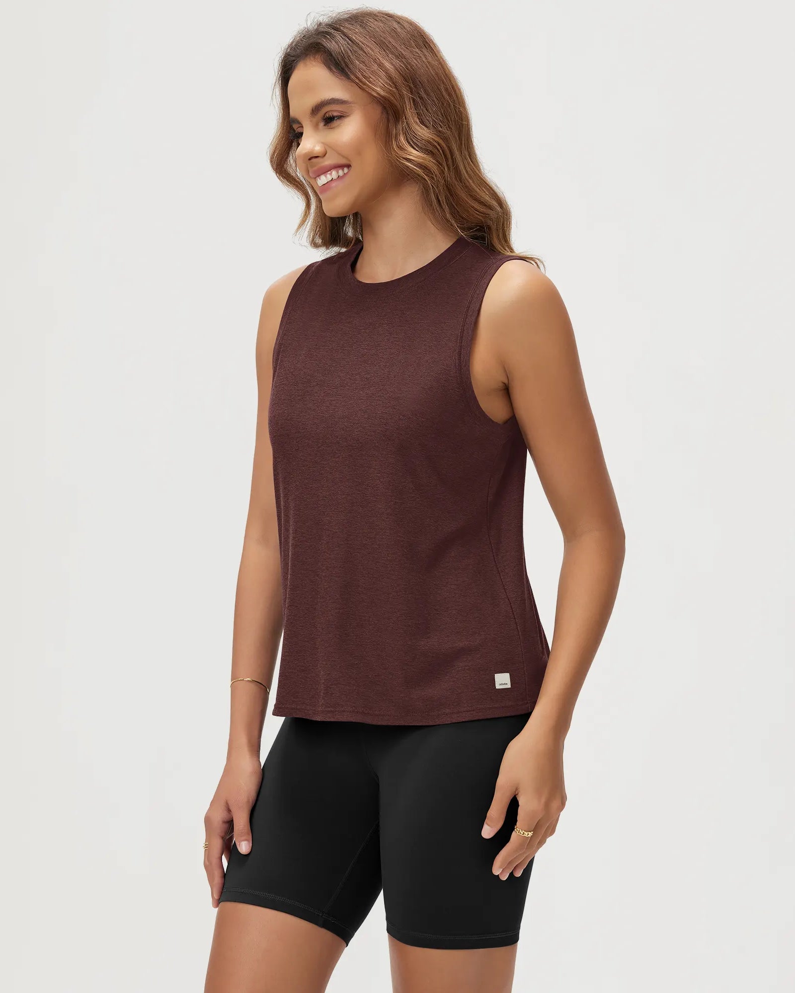 ODODOS Stratum Women's Performance Tank in soft fabric with athletic fit.