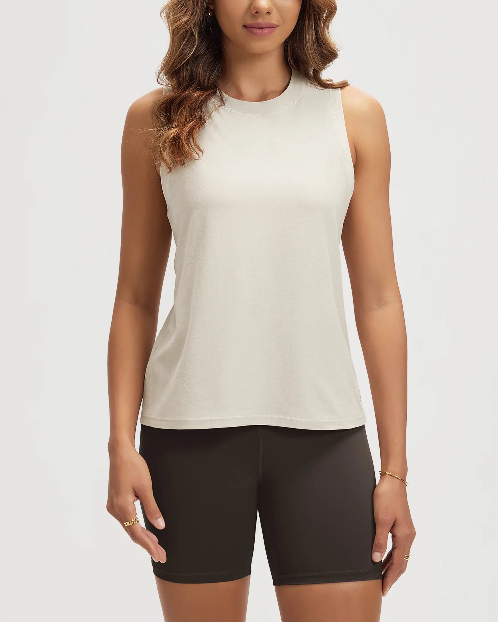 ODODOS Stratum Women's Performance Tank in soft fabric, perfect for workout wear and summer essentials.