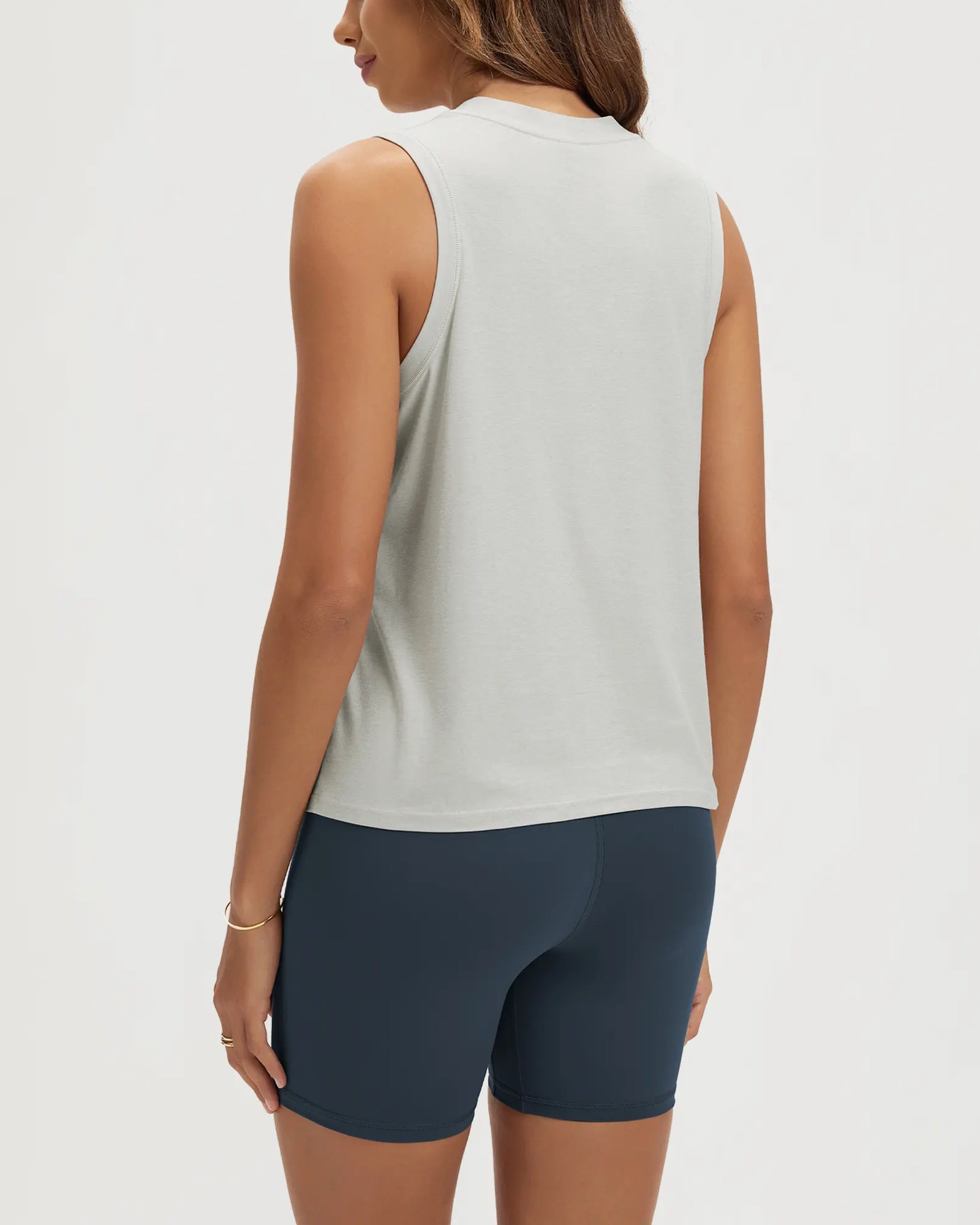 ODODOS Stratum Women's performance tank with breathable soft fabric and athletic fit.
