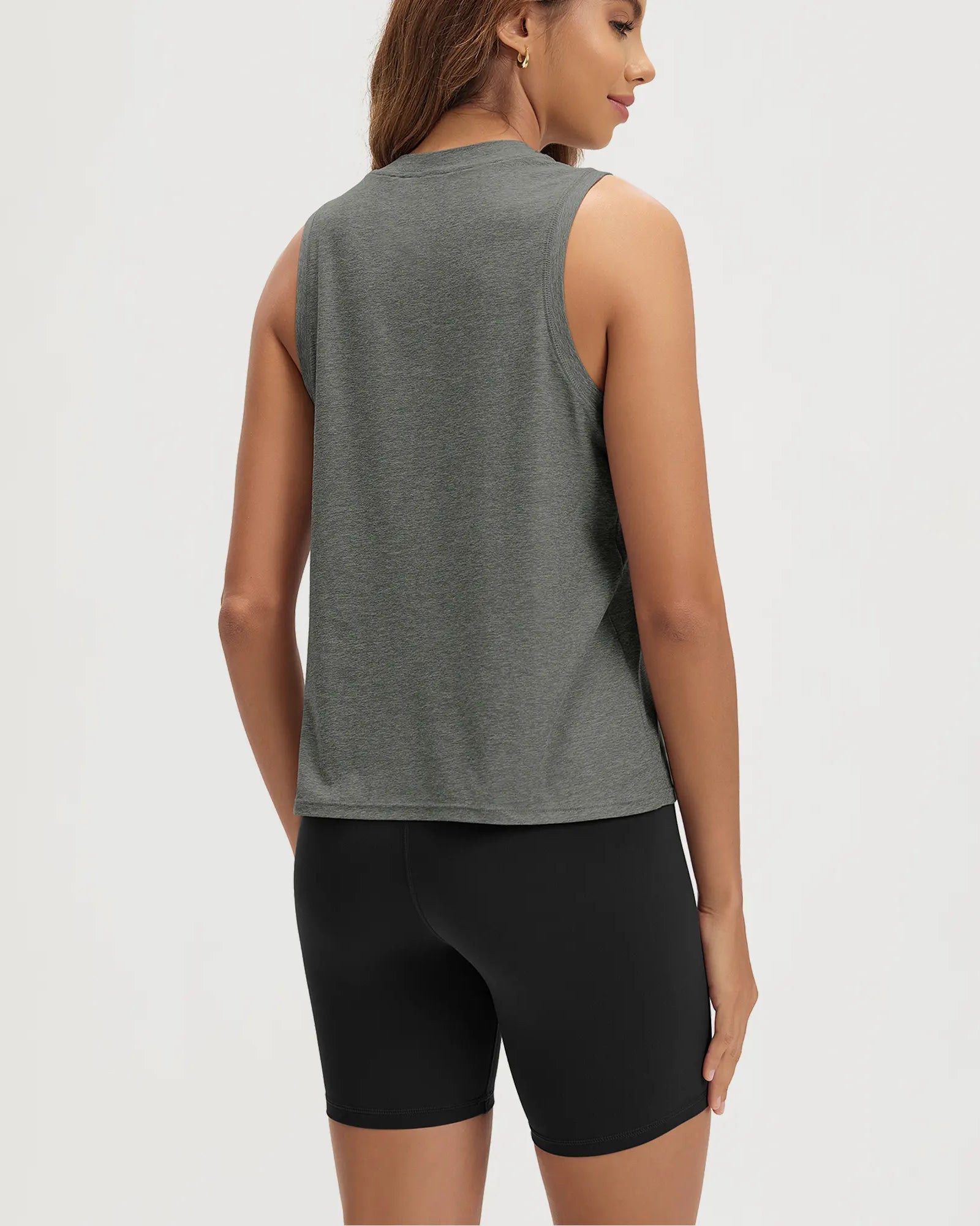 ODODOS Stratum Women's Performance Tank in gray, showcased with black workout shorts.