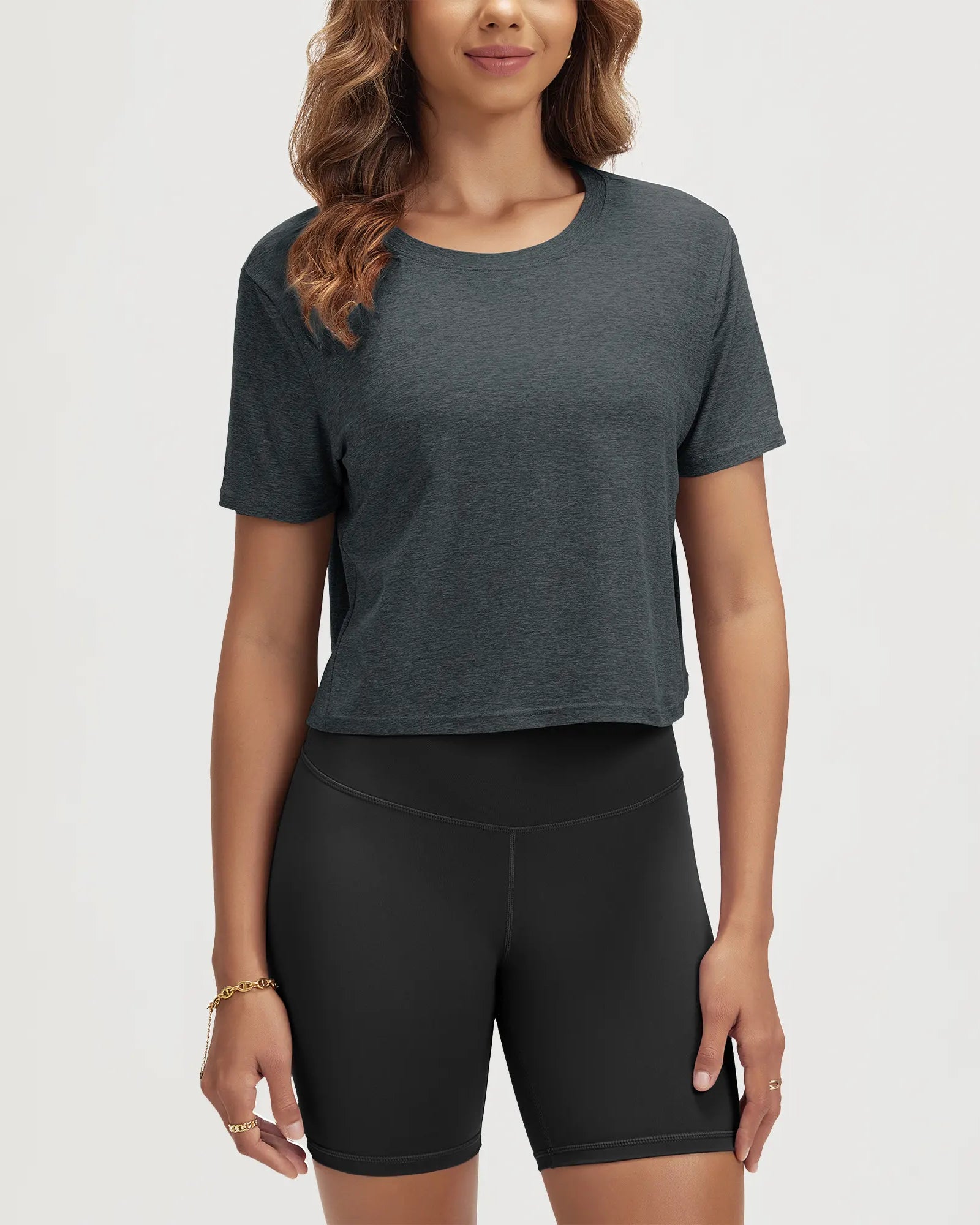 ODODOS Stratum Women's Performance Cropped Tee in soft fabric, perfect for workout wear.