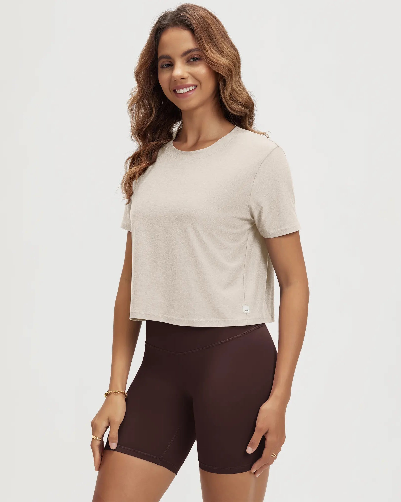 ODODOS Stratum Women's Performance Cropped Tee in soft fabric with athletic fit.