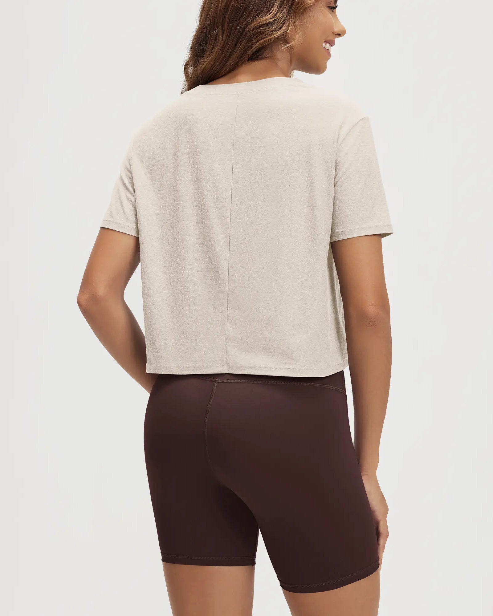 ODODOS Stratum Women's Performance Cropped Tee with soft fabric and athletic fit, paired with modal shorts.