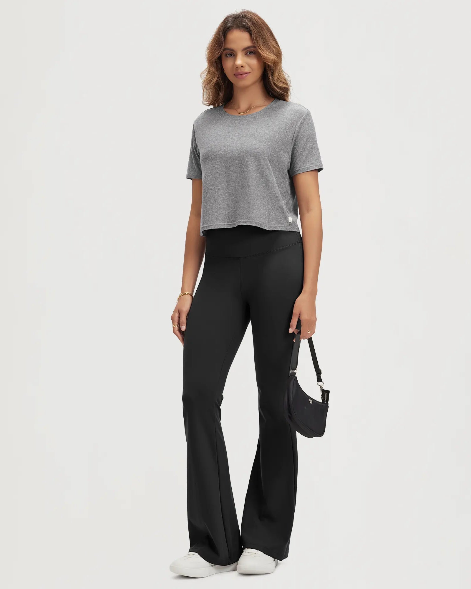 ODODOS Stratum Women's Performance Cropped Tee paired with soft fabric flared pants.