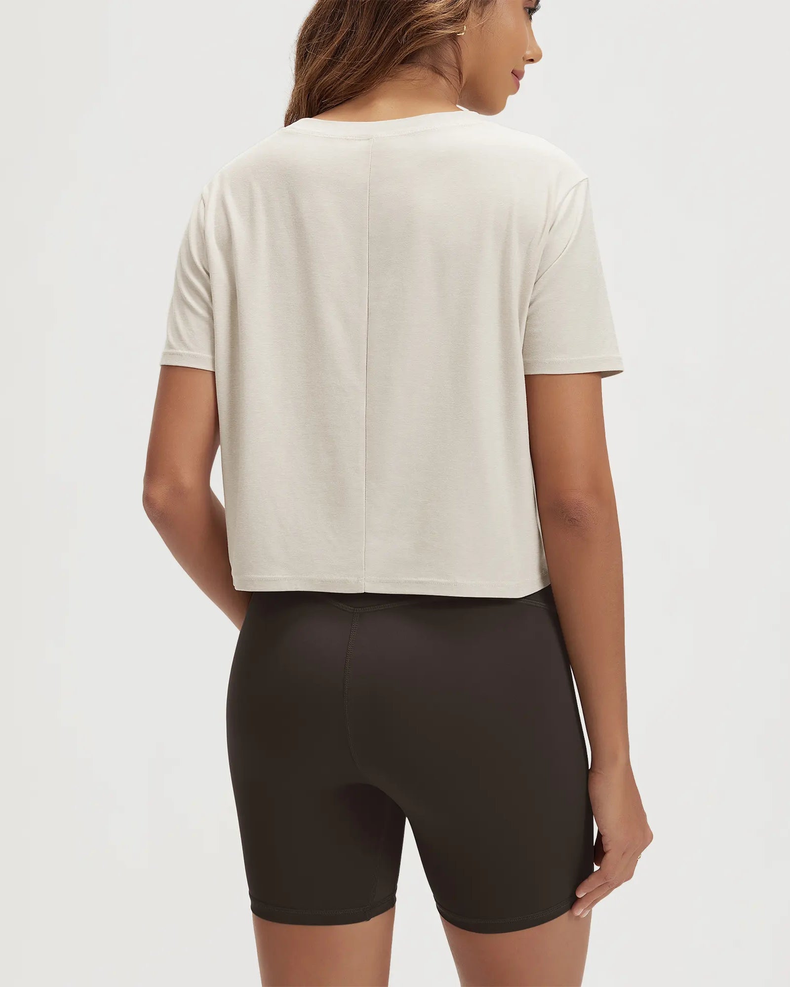 ODODOS Stratum Women's Performance Cropped Tee, soft fabric, athletic fit, perfect for workout wear.