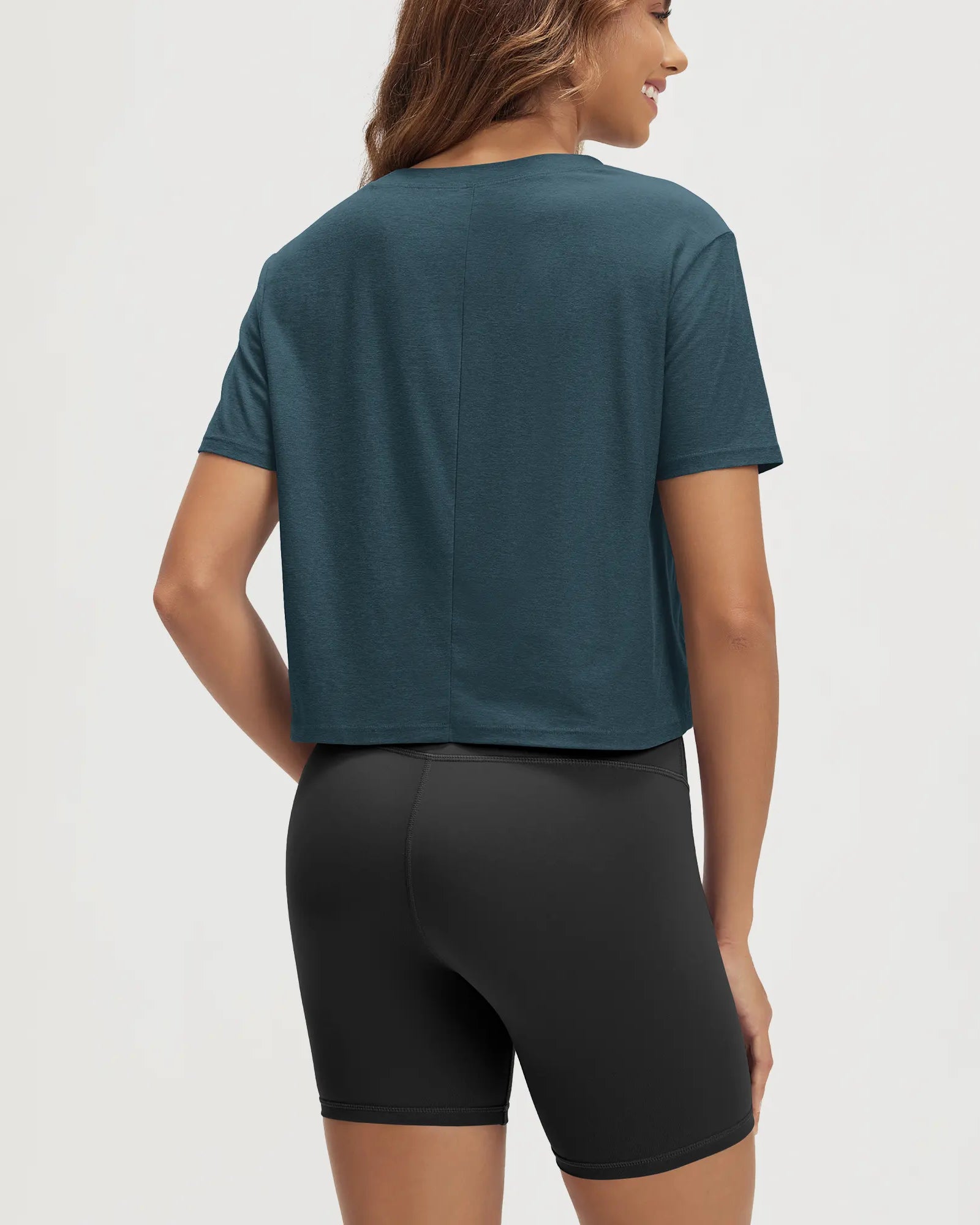 ODODOS Stratum Women's Performance Cropped Tee with soft fabric, perfect for workout wear.