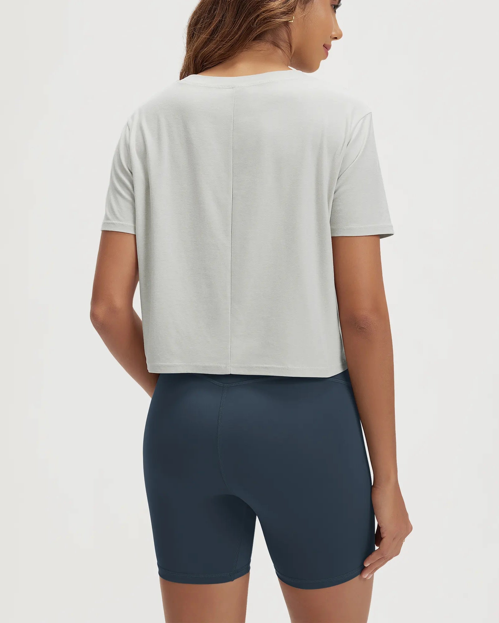 ODODOS Stratum Women's Performance Cropped Tee with soft fabric and athletic fit.