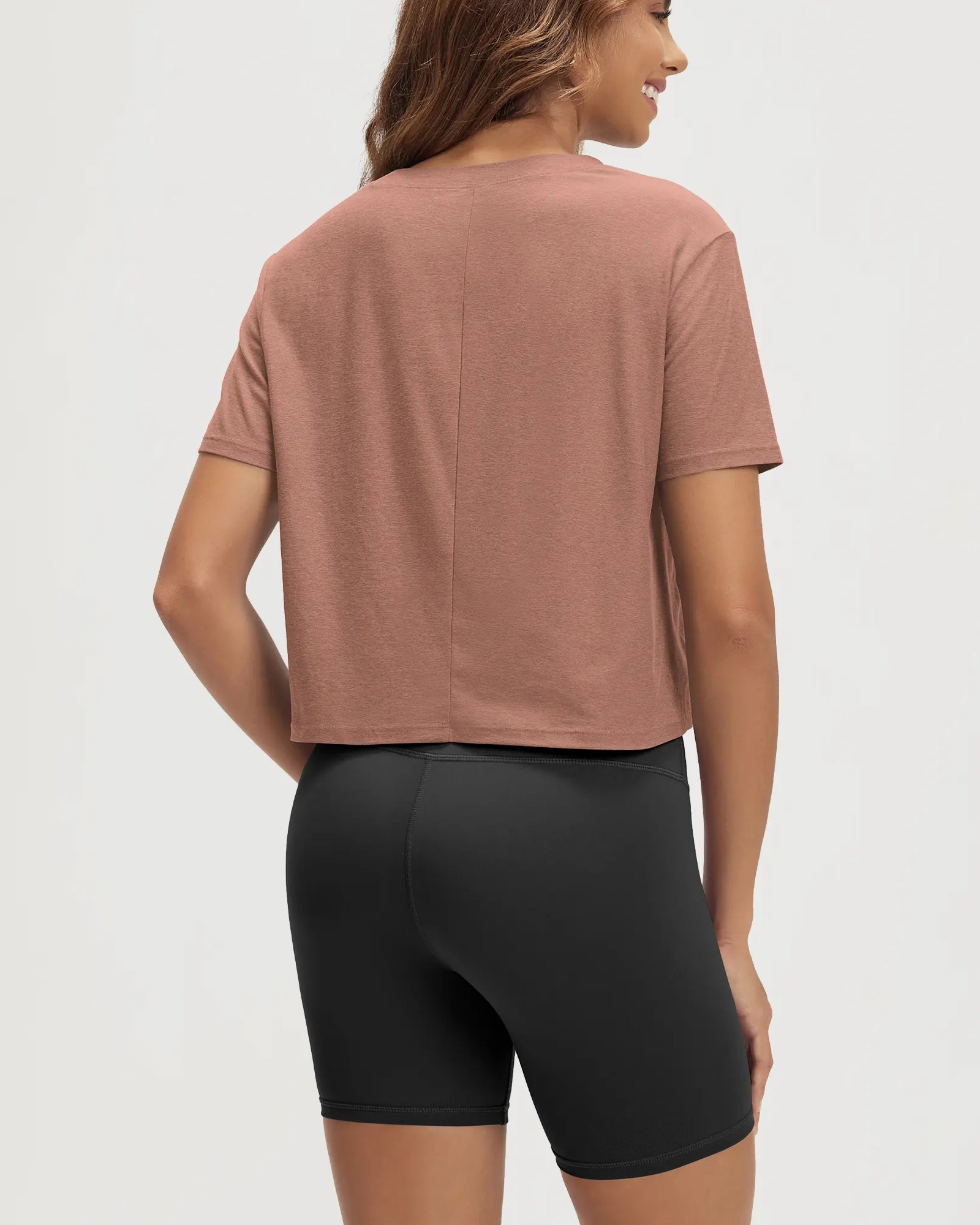 ODODOS Stratum Women's performance cropped tee showcasing soft fabric and athletic fit with modal shorts.
