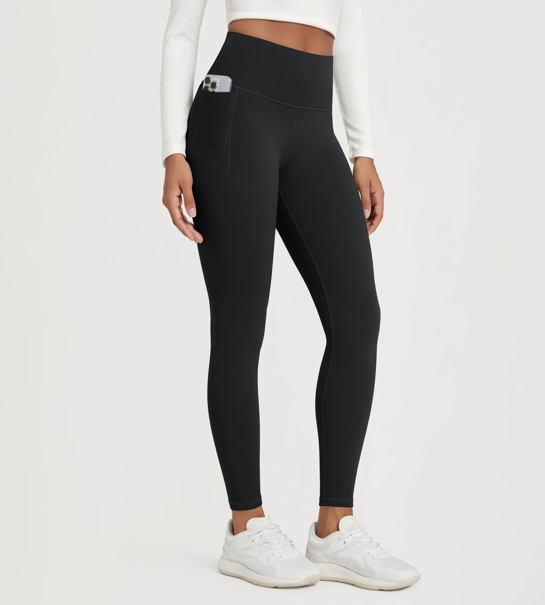 25" Fleece Lined Leggings with Pockets, perfect for comfort and style during workouts or casual wear.