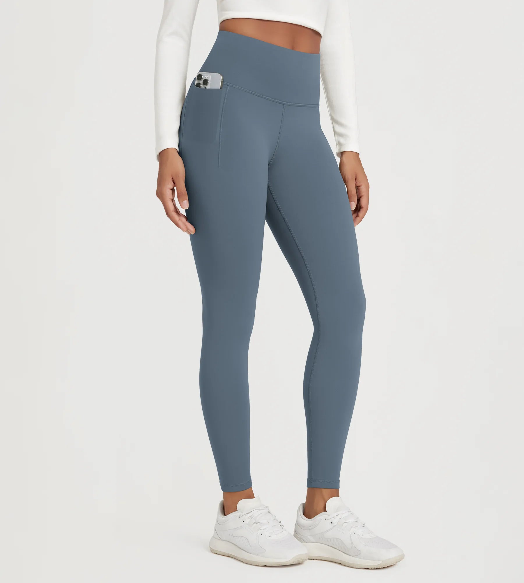 Comfortable 25" Fleece Lined Leggings with Pockets in blue, perfect for workouts and casual wear.