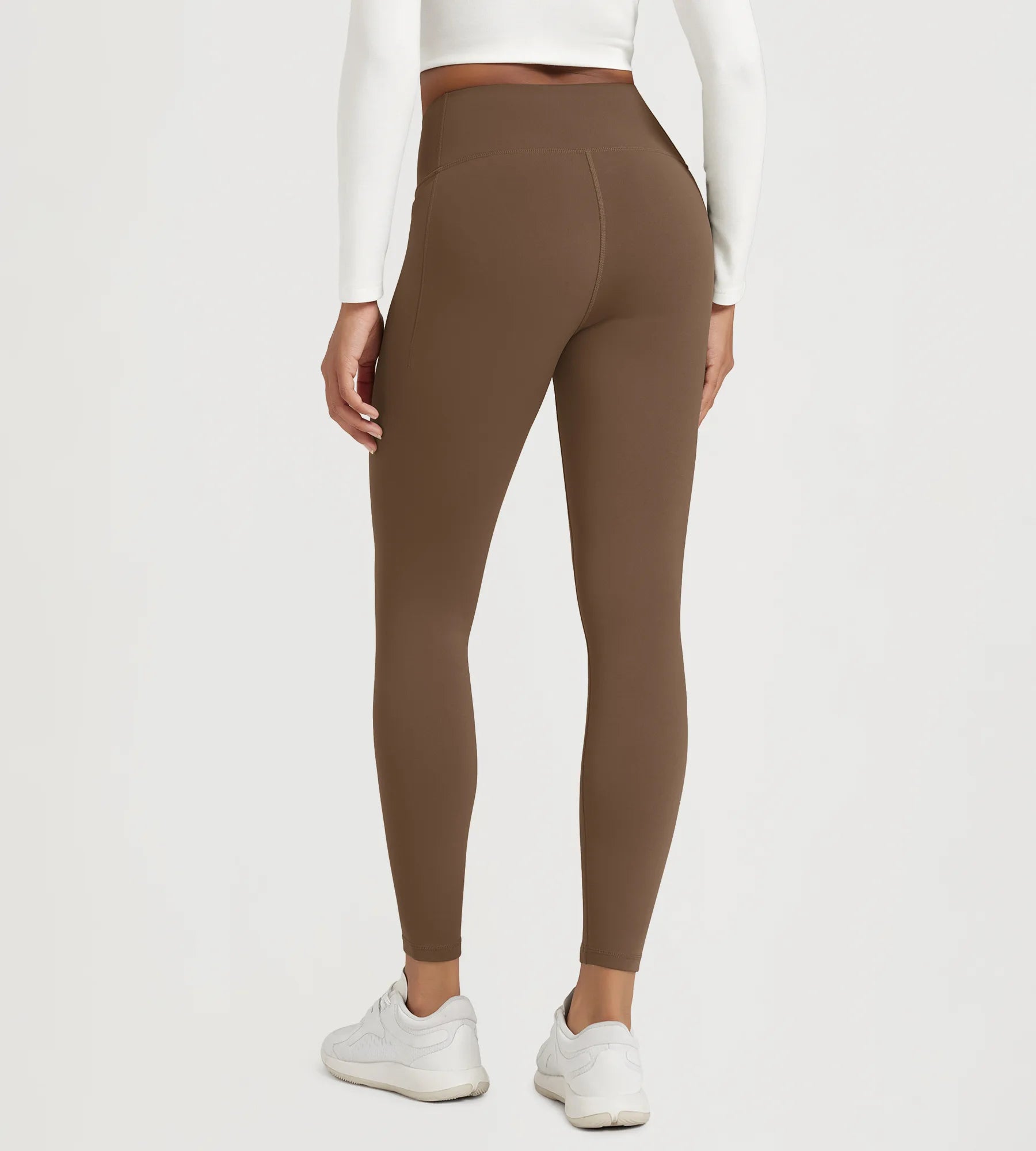 25" Fleece Lined Leggings with Pockets in brown color, featuring a high-waisted design and a comfortable fit.