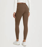 25" Fleece Lined Leggings with Pockets in brown color, featuring a high-waisted design and a comfortable fit.