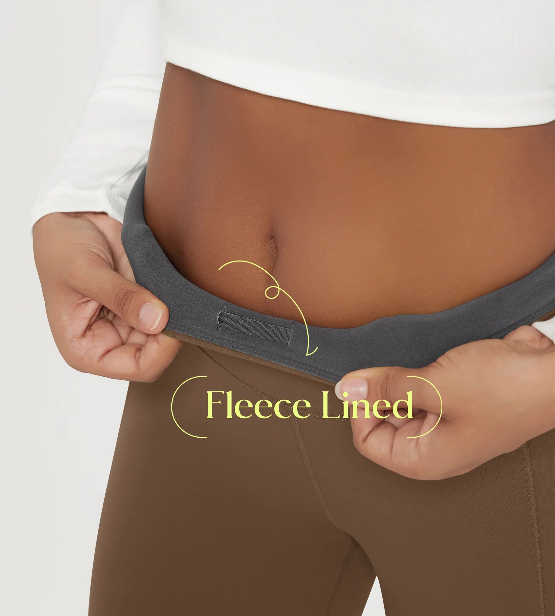 Model demonstrating the comfort and fit of 25" Fleece Lined Leggings with Pockets, highlighting the fleece lining.