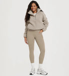 25" Fleece Lined Leggings with Pockets paired with a cozy fleece jacket and stylish footwear.