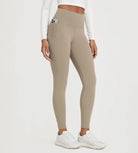 25" Fleece Lined Leggings with Pockets in khaki, featuring a side pocket for convenience.
