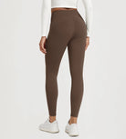 25" Fleece Lined Leggings with Pockets shown from the back, featuring a sleek brown design and comfortable fit.