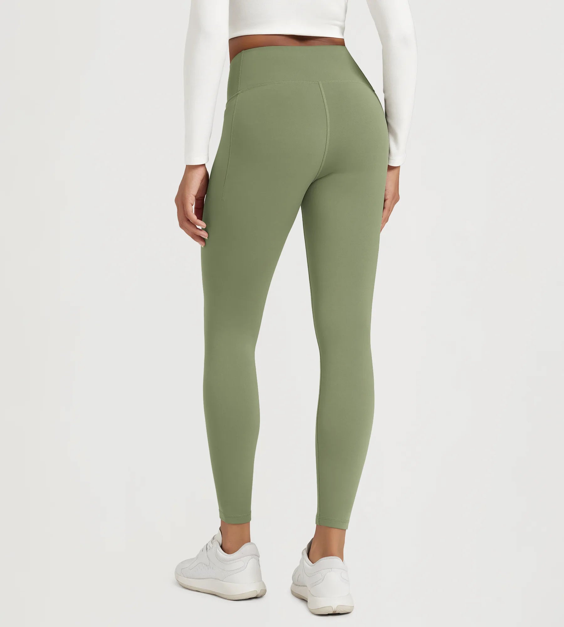 25" Fleece Lined Leggings with Pockets in green, showcasing the back view and high waist design.