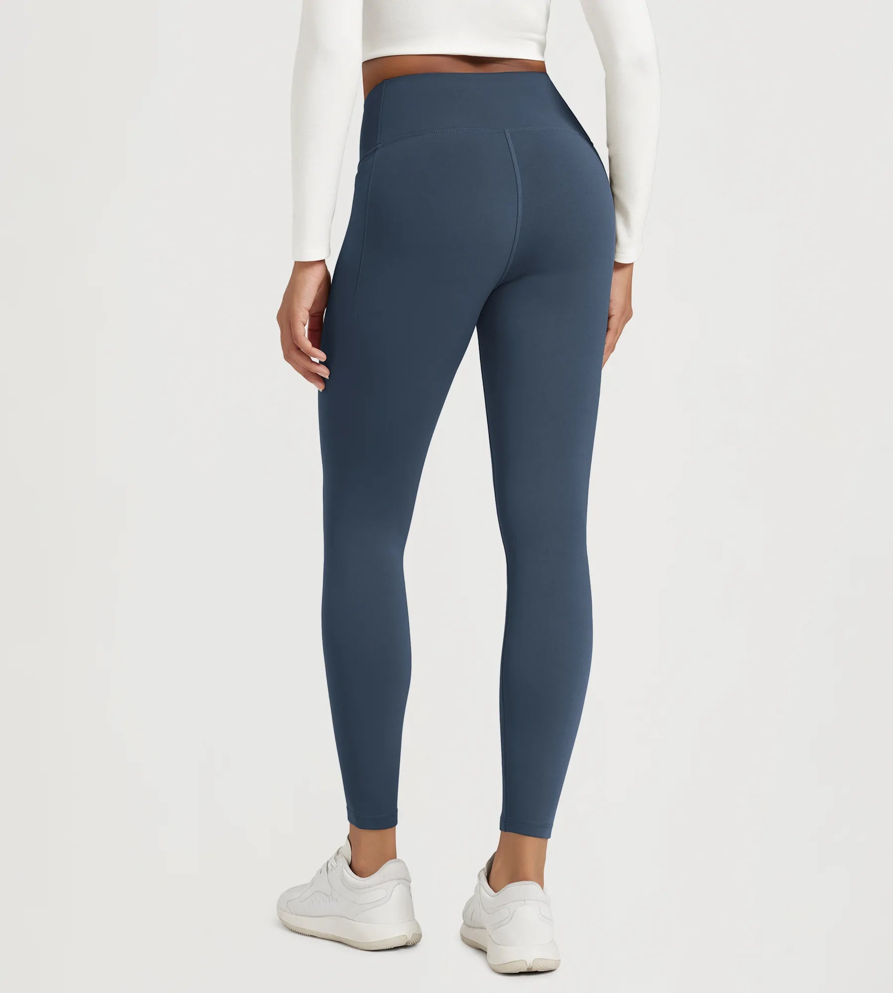 25" Fleece Lined Leggings with Pockets showcased in a stylish design, perfect for comfort and functionality.