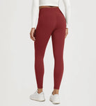 25" Fleece Lined Leggings with Pockets in burgundy, showing backside view with stretchy design.