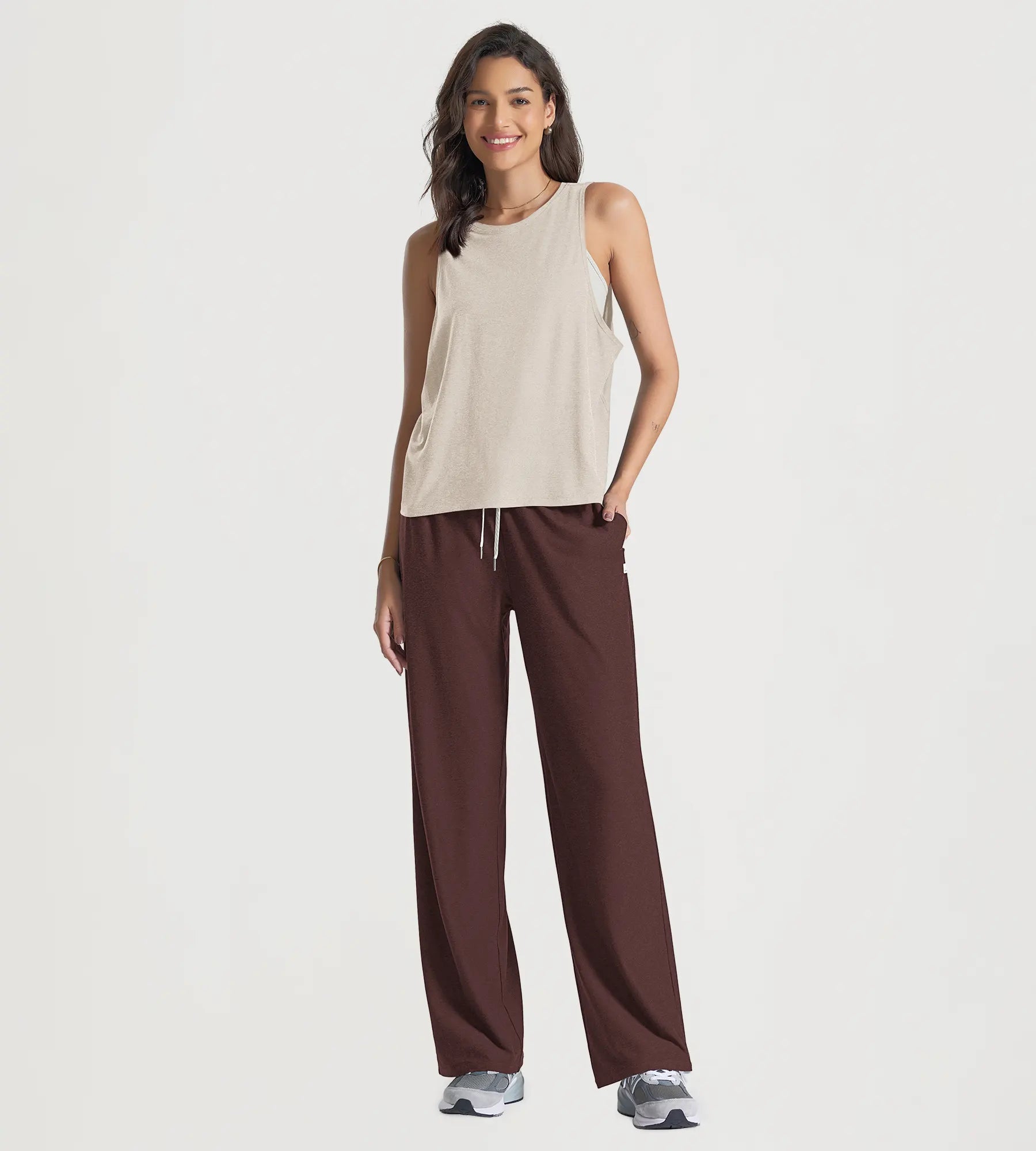 ODODOS Stratum Loose Tank Top paired with comfortable athletic pants for summer wear.