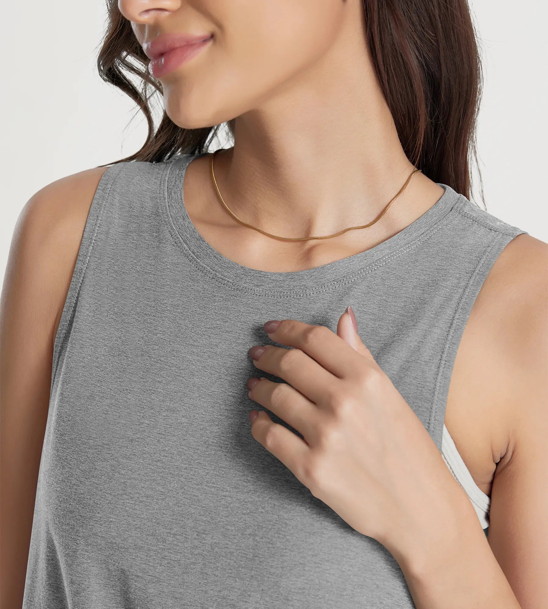 ODODOS Stratum loose tank top, featuring breathable soft fabric and athletic fit.