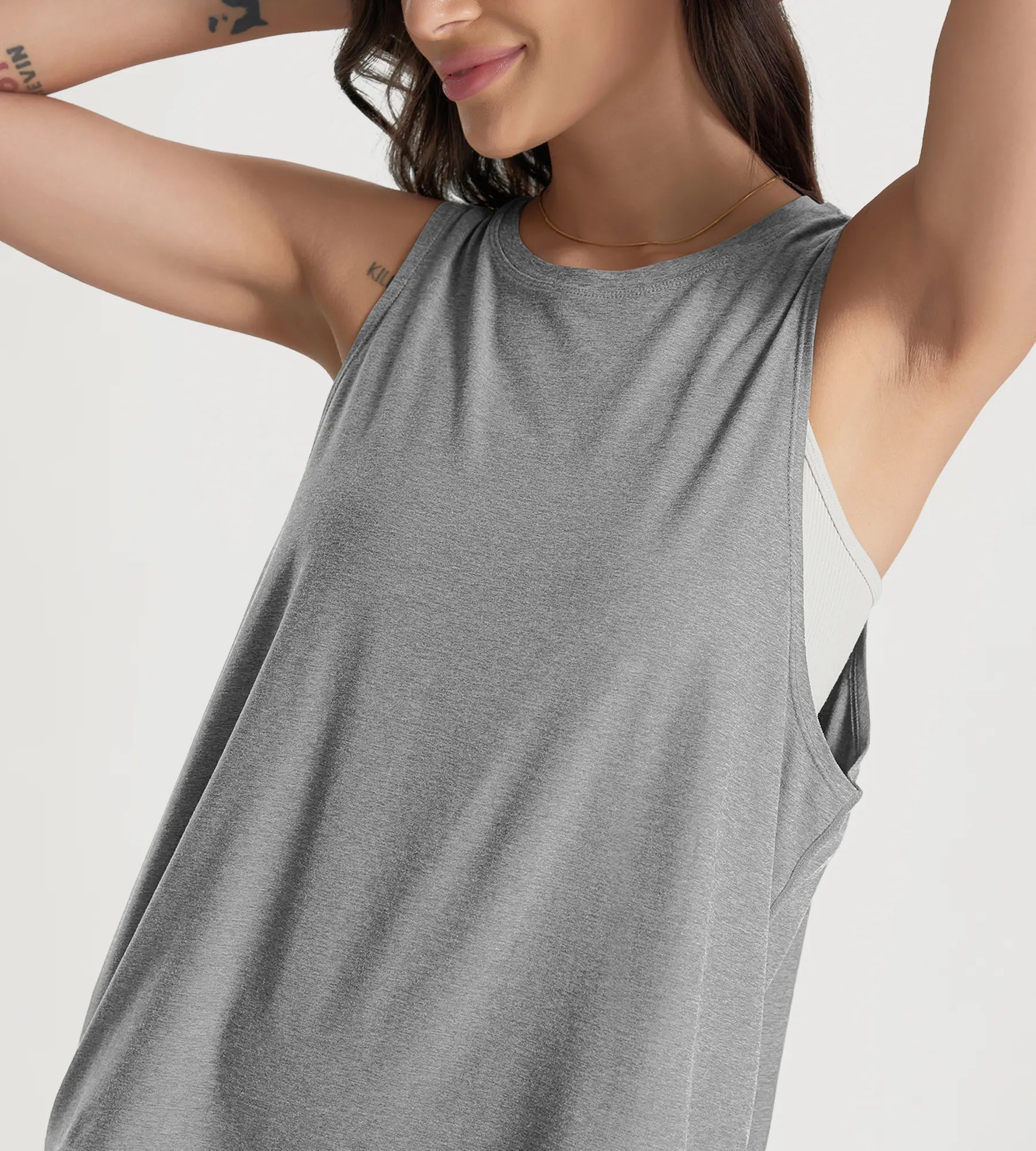 ODODOS Stratum performance tank in gray, featuring soft fabric and loose fit.